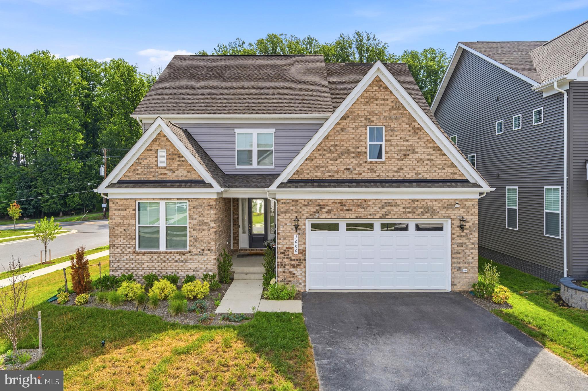 Welcome to 3000 Wind Whisper Way, where luxury, versatility, and thoughtful design come together in one exceptional residence. Nestled on a beautifully landscaped corner lot in Upper Marlboro, this impressive home offers four levels of meticulously designed living space, featuring 6 bedrooms, 5 full bathrooms, and an ideal layout for multi-generational living, entertaining, and everyday comfort.

As you arrive, you'll immediately notice the home's stately curb appeal and the convenience of two separate entrances. The main entrance welcomes you through an elegant foyer highlighted by a grand oak staircase that sets the tone for the sophisticated finishes found throughout. Just off the left side of the home, a private entrance leads to a fully equipped guest suite complete with its own kitchen, living room, spacious bedroom, and full bathroom, perfect for extended family, overnight guests, or those seeking additional privacy.

Step inside the main living area and experience an open concept floor plan enhanced by rich hardwood flooring, recessed lighting, and a stunning custom media wall with ambient accent lighting that creates a warm and inviting atmosphere. The expansive family room flows effortlessly into the gourmet kitchen, thoughtfully designed for both everyday living and entertaining. Featuring premium stainless steel appliances, beautiful cabinetry, designer backsplash, an oversized center island, generous counter space, and a dedicated coffee bar, this kitchen is truly the heart of the home. The adjoining dining area offers the perfect setting for intimate dinners or larger gatherings.

Just beyond the living space, sliding doors open to a covered, screened-in patio, creating a seamless indoor/outdoor lifestyle. Whether you're enjoying your morning coffee, hosting weekend barbecues, or simply relaxing while overlooking the fully fenced backyard, this outdoor retreat is designed to be enjoyed year-round.

Upstairs, the second level offers a luxurious owner's suite designed as a private retreat, complete with a spacious bedroom, spa-inspired en-suite bathroom, and ample closet space. Two additional generously sized bedrooms share a well-appointed full bathroom, while a versatile flex space provides endless possibilities as a home office, reading nook, playroom, or additional lounge area.

The fourth level adds yet another layer of flexibility with an expansive loft, an additional bedroom, and a full bathroom, ideal as a private guest retreat, teen suite, home gym, creative studio, or second office.

The home's entertainment continues in the fully finished lower level, where you'll find a spacious recreation room, an additional den, a full bathroom, and a dedicated media/game room that is perfect for movie nights, game days, or entertaining family and friends. Walk-up access to the backyard makes indoor and outdoor gatherings effortless.

Located in one of Upper Marlboro's desirable communities, this home offers convenient access to shopping, dining, parks, and recreational amenities, while commuters will appreciate easy access to Route 301, Route 4, I-495, and nearby Metro stations, providing a convenient commute to Washington, D.C., Northern Virginia, and surrounding employment centers.

Offering exceptional space, elegant finishes, and a floor plan designed to accommodate today's modern lifestyle, 3000 Wind Whisper Way presents a rare opportunity to own a home that truly has room for everyone.

Schedule your private tour today and experience everything this remarkable home has to offer.