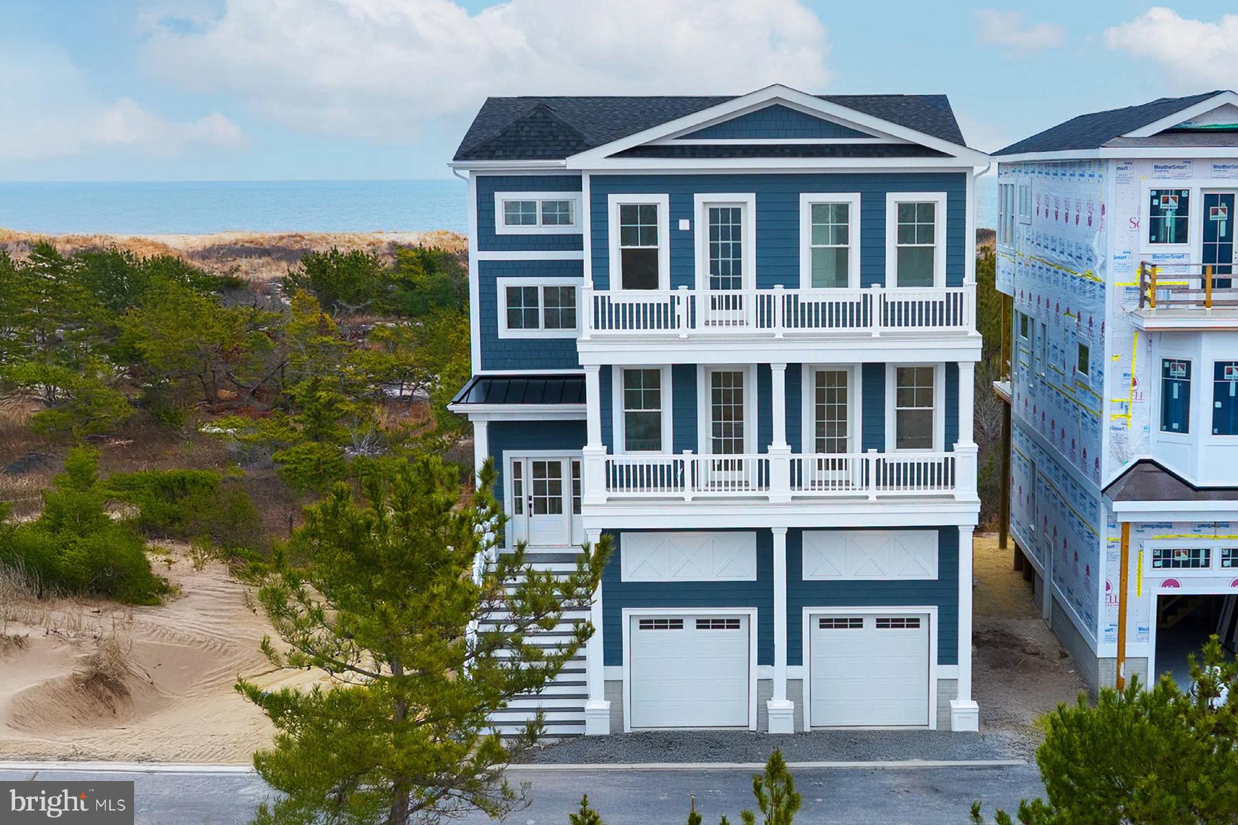 From Sunrise to sunset, our water views will WOW you! Introducing Sunrise—an exclusive new community of just six luxury oceanfront homes in Bethany Beach. 

This newly constructed oceanfront home awaits you!  Enjoy panoramic vistas of both the sunrise and sunset, with uninterrupted water views throughout the day from the comfort of your own home or from your oceanfront deck equipped with a built-in SS outdoor grill/grilling area.  This custom home has too many beautiful finishes to list so HURRY and make an appointment to view this amazing coastal gem TODAY!

Last Available Oceanfront Lots in Delaware: This is a unique opportunity to live in an oceanfront home on one of the few remaining homesites along Delaware’s coastline. The surrounding area features established residences or is protected by state-owned land.
Preserved Views: The property is bordered by state-owned land, ensuring that your scenic view will remain unobstructed for years to come.
Prime Location: Ideally situated in between Bethany Beach and Dewey Beach, offering the perfect balance of privacy and access to local amenities.
Convenient Access to Indian River Marina: Enjoy easy proximity to the renowned Indian River Marina, ideal for boating and other recreational activities.
Exceptional Value: These oceanfront lots are strategically priced to offer you the best possible value for a premium coastal property.

For further information and to schedule your private showing please call Kim Dyer.  On site sales available Thursday-Sunday 10-4 p.m.