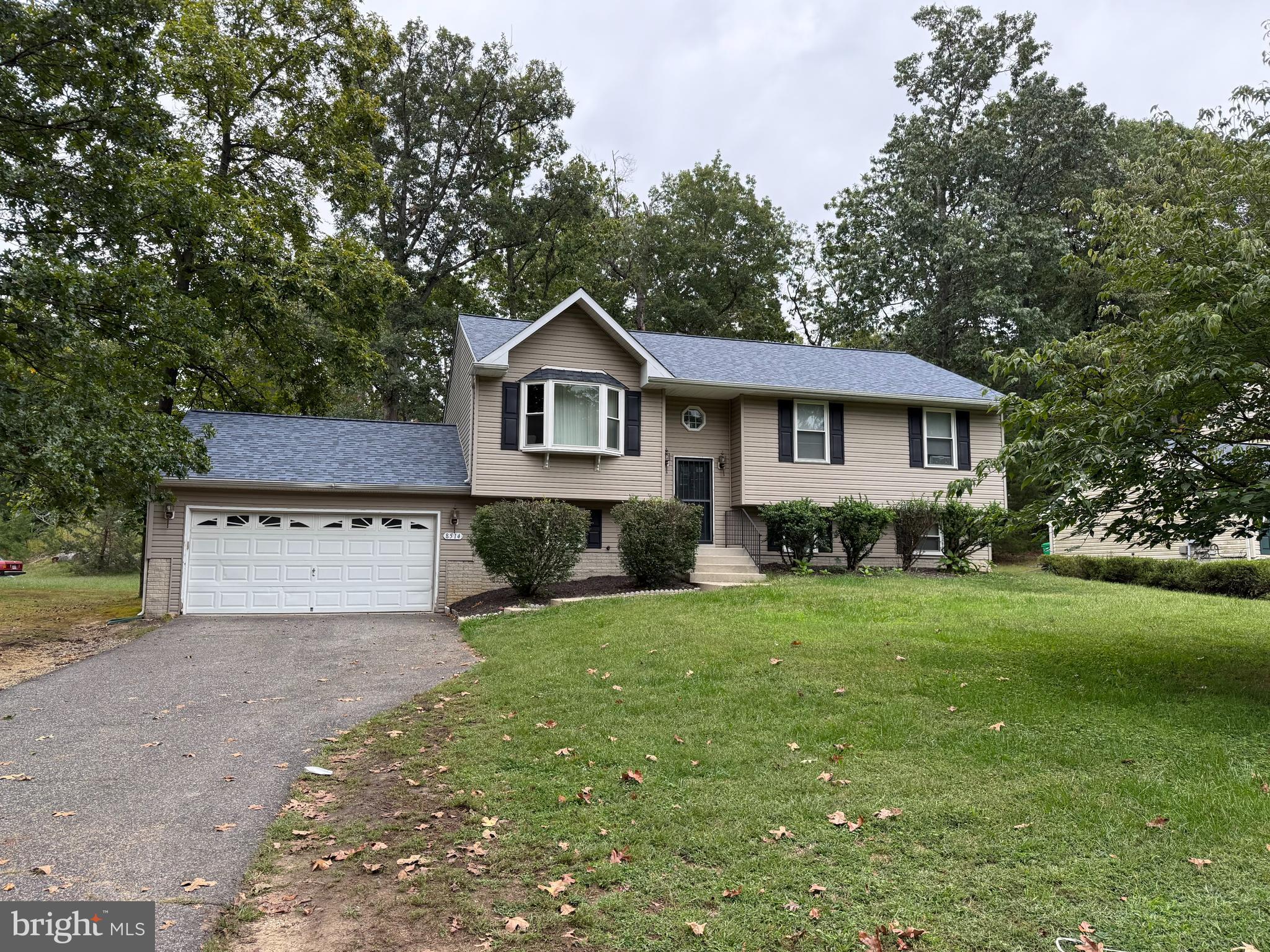 Beautifully updated split foyer in the heart of Clinton. This charming home features 5 bedrooms, 4 baths, living room, dining room, and kitchen with peninsula with stainless steel appliances. 
Hardwood floors and recessed lighting throughout main level. Dining room has sliding door that goes to a nice sized deck and a large backyard. Home sits on almost half of an acre. 
*Main level has a primary bedroom with a private bath and 2 additional large bedrooms that share a full bath. 
*Lower level has 2 bedrooms, full bath with glass doors and niche, recreation room/dining combo with kitchenette with stainless steel appliances with private side entrance. New luxury vinyl plank flooring throughout. Ideal in-law suite.
Also, attached are 2 extra bonus rooms that can be used as an office/library/ or den with full bath, sitting area, and kitchenette. Perfect if you work from home. Large driveway with plenty of street parking. Hurry! This will not last long.