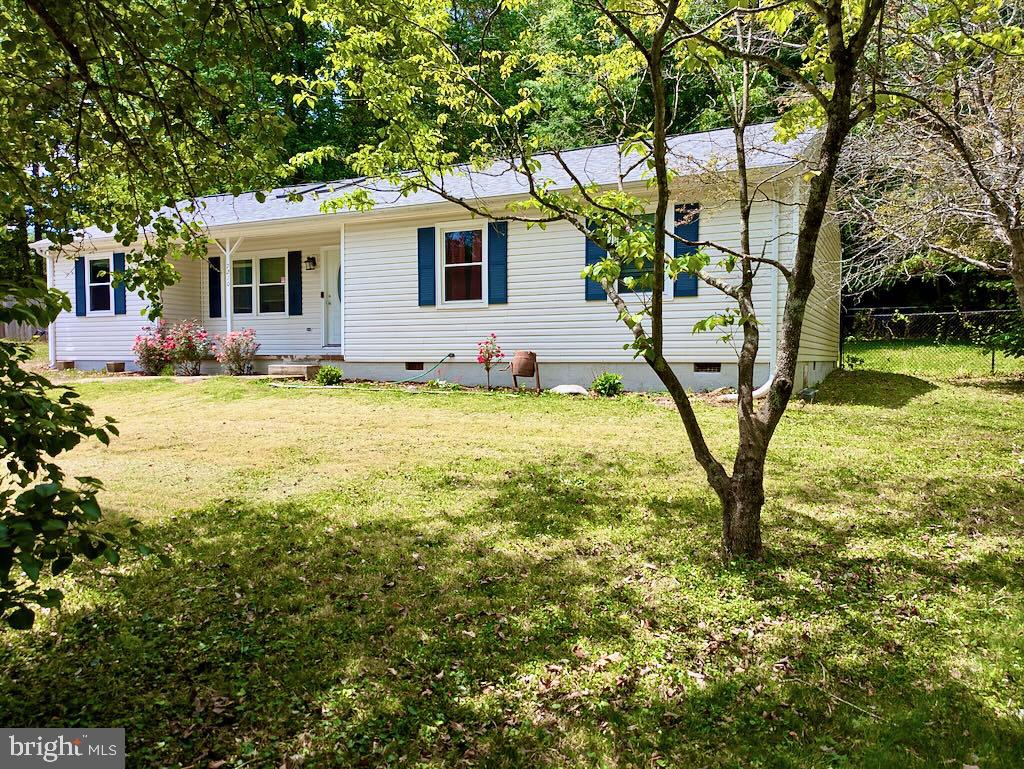 This Beautiful 3 Bedroom Home sits on a Cul De Sac in a Great Location near Spotsylvania Courthouse! You will love the Open Floor Plan with LVP Flooring and Updated Windows. There is also a Large 2nd Family Room that could easily be used as a 4th Bedroom, Office or Rec Room! This room, as well as the Dining Room, walk out to the Patio and Huge Fenced Backyard with 2 Sheds that backs to Woods. The Roof was replaced in 2018.  You Don't want to miss this one! Photos Coming