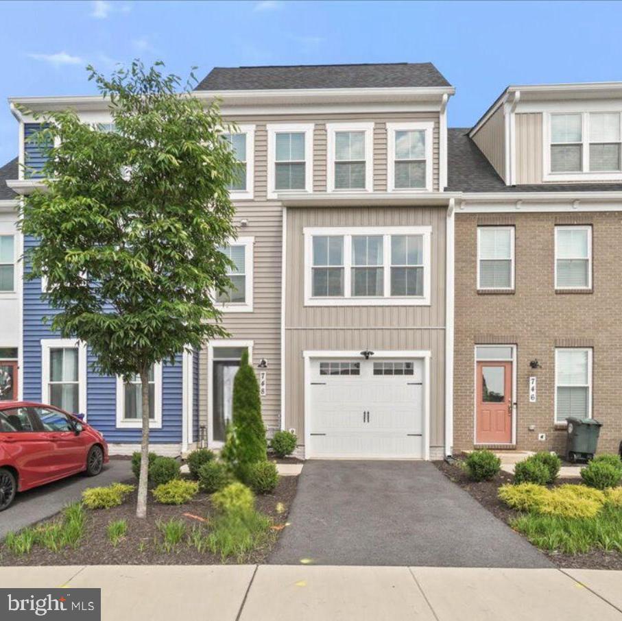 Seize the opportunity make this stunning luxury 3-story townhome yours! Boasting an abundance of windows that flood the space with natural light, an open floor plan ideal for entertaining, and breathtaking 12-foot ceilings in the family room, this home offers unparalleled grandeur.

Step into serenity in the spacious owner's bedroom, complete with a ceiling fan for added comfort, and retreat to the covered rear terrace for relaxation and al fresco dining. The finished basement provides additional living space, while the backyard, single-car garage, and driveway offer convenience and versatility.

Don't wait to experience the luxury lifestyle this home affords – schedule a viewing today and discover why this is the perfect place to call home!