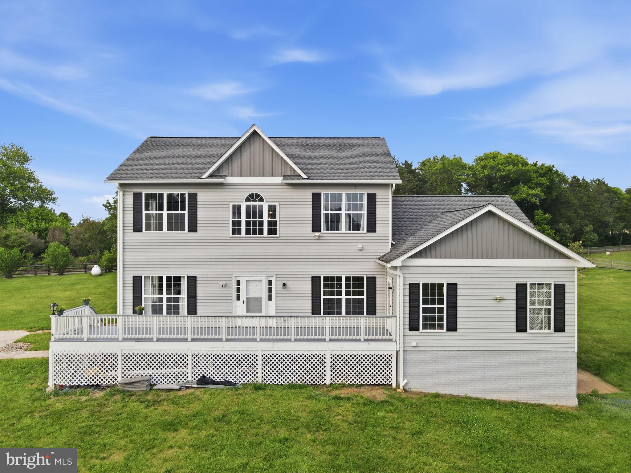 Stunning 17+ acre Nokesville property offering an exceptional blend of equestrian functionality, agricultural potential, and comfortable multigenerational living. This expansive, flat, and fully usable acreage includes an 8‑stall center‑aisle barn with the option to add 4 exterior stalls, five fenced pastures each equipped with run‑in access, and an Olympic‑size riding ring designed for training, lessons, or business operations. The land is cleared, open, and thoughtfully laid out to support horses, livestock, or a full equestrian enterprise. The updated home features a modernized kitchen with newer appliances and granite countertops, refreshed bathrooms, new flooring, paint, and lighting throughout, plus a fully finished basement adding two additional bedrooms and a full bath for expanded living space. A separate 1BR/1BA apartment with private entrance, full kitchen, new carpet, and washer/dryer hookup provides ideal accommodations for in‑laws, a caretaker, adult children, or rental income. This rare turnkey equestrian property delivers space, versatility, and opportunity. New photos coming soon.