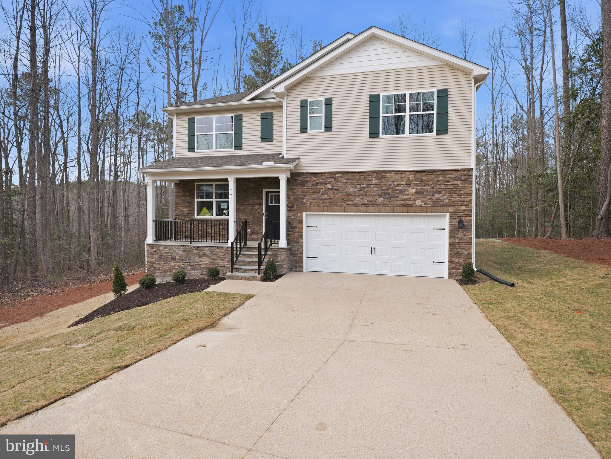 Welcome to the 2,511 sq ft Hayden model - a stunning new home on a spacious 1.6 acre homesite in the heart of Keswick, VA. This thoughtfully designed floor plan offers an open-concept main level with a spacious living room, dining area, modern kitchen with walk-in pantry, a full bedroom and bath, plus a versatile flex room perfect for a home office or playroom. Upstairs, you'll find a second living space, a luxurious primary suite with two large walk-in closets and a spa-like bath, three additional bedrooms, a full bath, and convenient upstairs laundry. Nestled just minutes from Charlottesville, Green Spring Estates blends modern comfort with timeless Virginia charm, surrounded by scenic countryside, wineries, mountain views, and historic attractions - everything you need to live, work, and play in peaceful luxury.