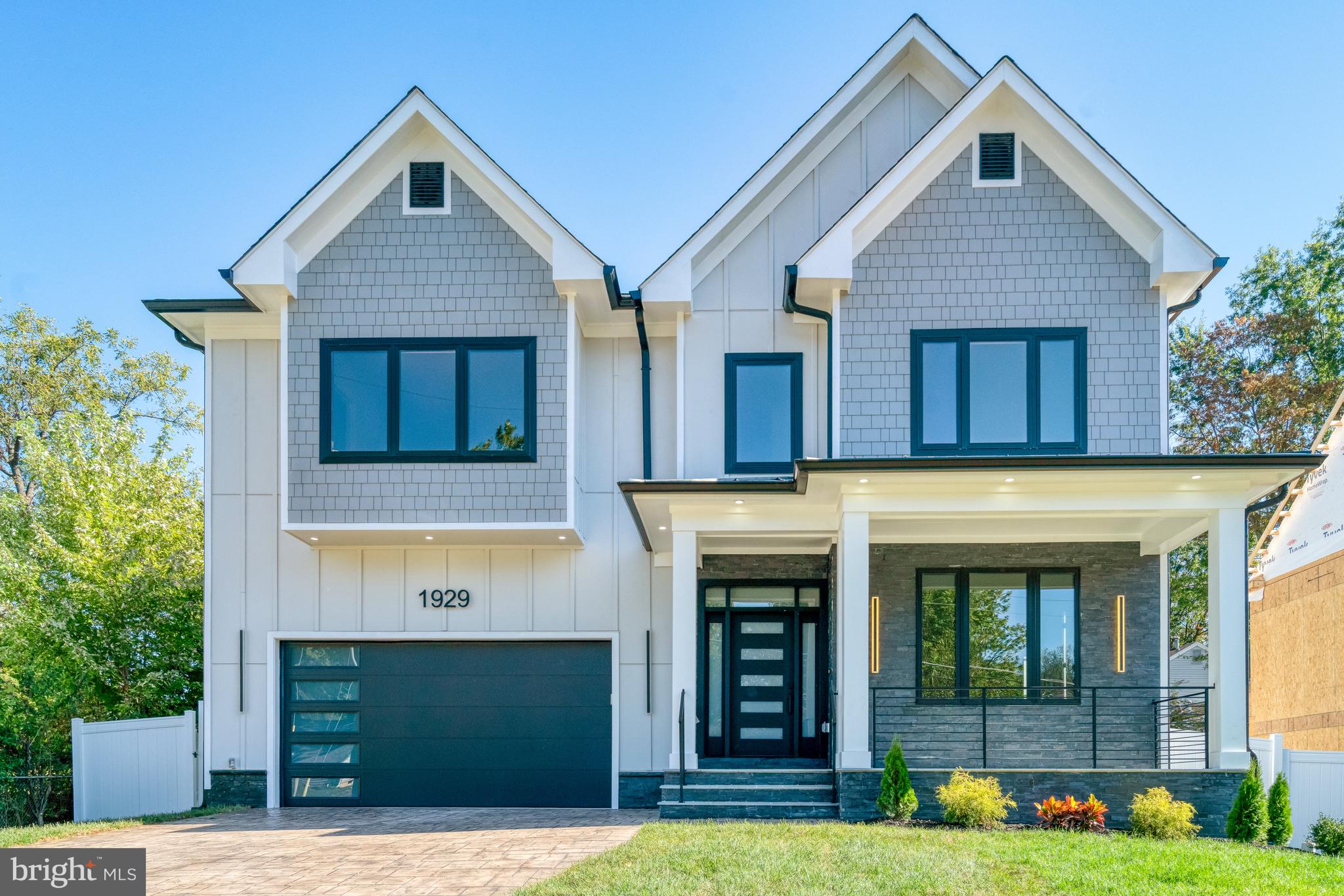 Welcome to this stunning home, with three finished levels, 6 bedrooms, 6 full baths and 2 half baths, in the highly desirable Pimmit Hills neighborhood. Fabulous location just minutes from Tysons Corner. Home has over 5,860sf., on a .25-acre lot. Fenced in back yard with a rear covered deck perfect for summer barbecues.  Main-Level open concept Kitchen w/island with top-of-the-line THOR appliances and large pantry. Family Room features a gas fireplace with a stone surround, formal dining room and a mudroom. Also, on main level is a bedroom with full bath plus a powder room. Upper-Level has the primary bedroom, His & Hers Walk in closet, Master Bath features His & Hers double sink, glass enclosed walk-in shower & soaking Tub. An additional three bedrooms all with walk in closets and full private bathrooms. An extra bonus room/office, Laundry Room with compact washer and dryer with sink and plenty of cabinets space. Hardwood floors throughout the first and second floor. The Lower-Level is fully finished with lots of light, large recreation room w/electric fireplace with stone surround, wet bar w/wine cooler, refrigerator, and dish washer.  One additional Bedroom with 1 full Bath and 1 half bath. LVP floors throughout the lower level. 
Perfect location just 2 miles from the vibrant Tysons Corner, less than a mile to McLean Metro Station and easy access to major routes: I-495, Dulles Toll Rd, Rt. 7, Rt. 123, I-66 and George Washington Memorial Pkwy.