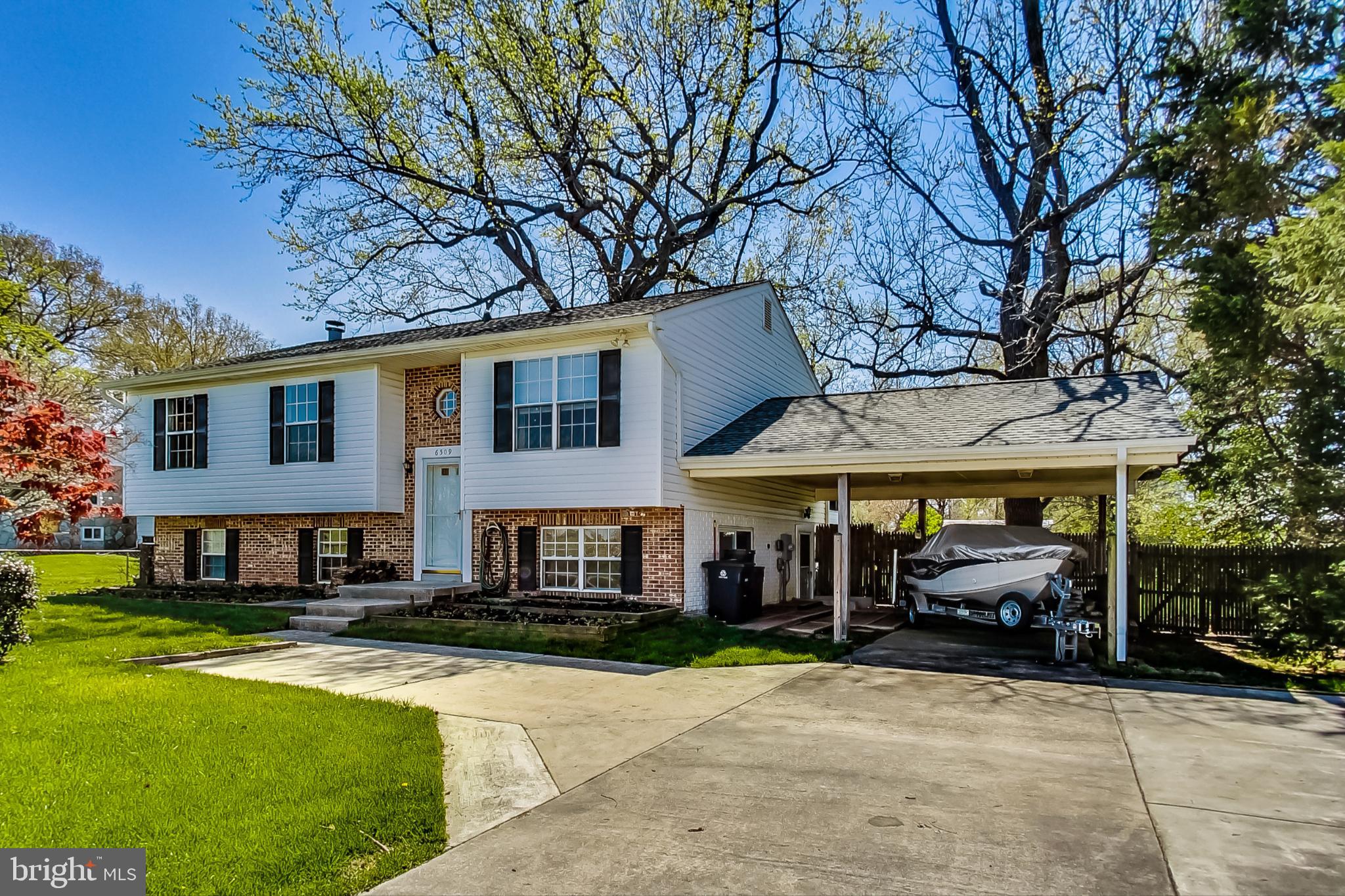Now available!!! Extraordinary 4 bedroom, 3 full bath split foyer located in the heart of the USDA Beltsville Farmland. This is your own retreat just minutes from the greenbelt metro, 495, 295, 95, 200, and marc. Nestled on a nearly ½ acre lot, the home is surrounded by farmland, and the backyard is fully fenced with a storage shed, a two-tiered deck, and a spacious, screened-in porch perfect for entertaining. Inside, you’ll immediately notice the attention to detail, with brand new flooring throughout and completely repainted from top to bottom. The eat-in kitchen is expansive with plenty of room for everyone. The upstairs features 3 spacious bedrooms and 2 full bathrooms. The fully finished lower level is spectacular!  Here you’ll find ample natural light, a 4th bedroom, and a 3rd full bathroom. The wood-burning fireplace, wet bar with a mini-fridge, and exit to the rear yard top it off!  The unfinished utility room houses the front-loading washer and dryer, the recently replaced water heater (2019), and the HVAC unit (2014).  It also affords plenty of room for storage as well as a 3rd entrance from the carport. This home is move-in ready and a rare opportunity in a superb location.  Don’t miss out!!!
