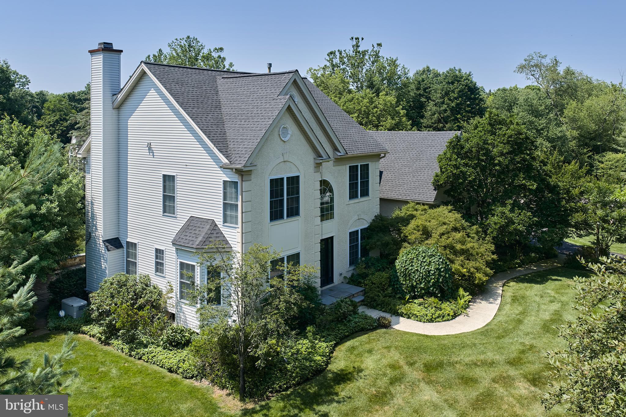 Nestled in one of New Hope's most desirable neighborhoods, this beautifully updated residence blends timeless elegance with modern comfort. Hardwood flooring flows throughout the main level, where formal living and dining rooms seamlessly complement the home's inviting everyday living spaces. The renovated gourmet eat-in kitchen is appointed with granite countertops, a Wolf gas range, Sub-Zero refrigerator, built-in oven and microwave, wine refrigerator, and abundant cabinetry. Just beyond, the family room is anchored by a gas fireplace, creating the perfect setting for everyday living and entertaining.
Upstairs, hardwood flooring continues throughout, leading to the owner's suite featuring a walk-in closet, an additional closet, and a beautifully renovated en-suite bath. Every bathroom in the home has been thoughtfully updated with timeless finishes. Three additional bedrooms share a beautiful hall bath.
Outside, professionally designed stone patios and a partially fenced backyard provide outdoor living, offering the perfect space for entertaining, relaxing, or pets. Ideally located just minutes from the shops, restaurants, and vibrant lifestyle of downtown New Hope and the Delaware River, this exceptional home offers the perfect blend of luxury, comfort, and convenience. Located in New Hope Solebury school district.