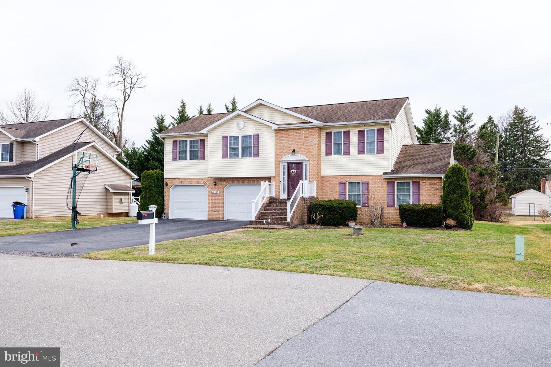 This is the one you have been waiting for!!   Two story foyer that leads to large living and dining rooms.
Enjoy the 12x12  deck.  The entire house  has been updated with todays modern colors.   Stainless steel
appliances.  First floor laundry.   Large primary  bedroom with walk in closet, water closet, full bath includin
tub shower and  walk in shower.   Two other bedrooms with another updated bathroom.  Lots of windows
and light.  The lower level boasts a large family room with gas fireplace and steps outside to a 12x12 patio.
The fourth bedroom and a mud room.   27x25 Attached garage.  Minutes to the Valley Mall, Interstate 70
and 81. One owner Home!!  Much larger then it looks!!! Custom Built by Bowers.  Motivated seller! Beautifully updated bathrooms.  Nothing spared here.  Move right in! Garage square footage not included
in the square footage of the house.   Newer windows.  shows like a model