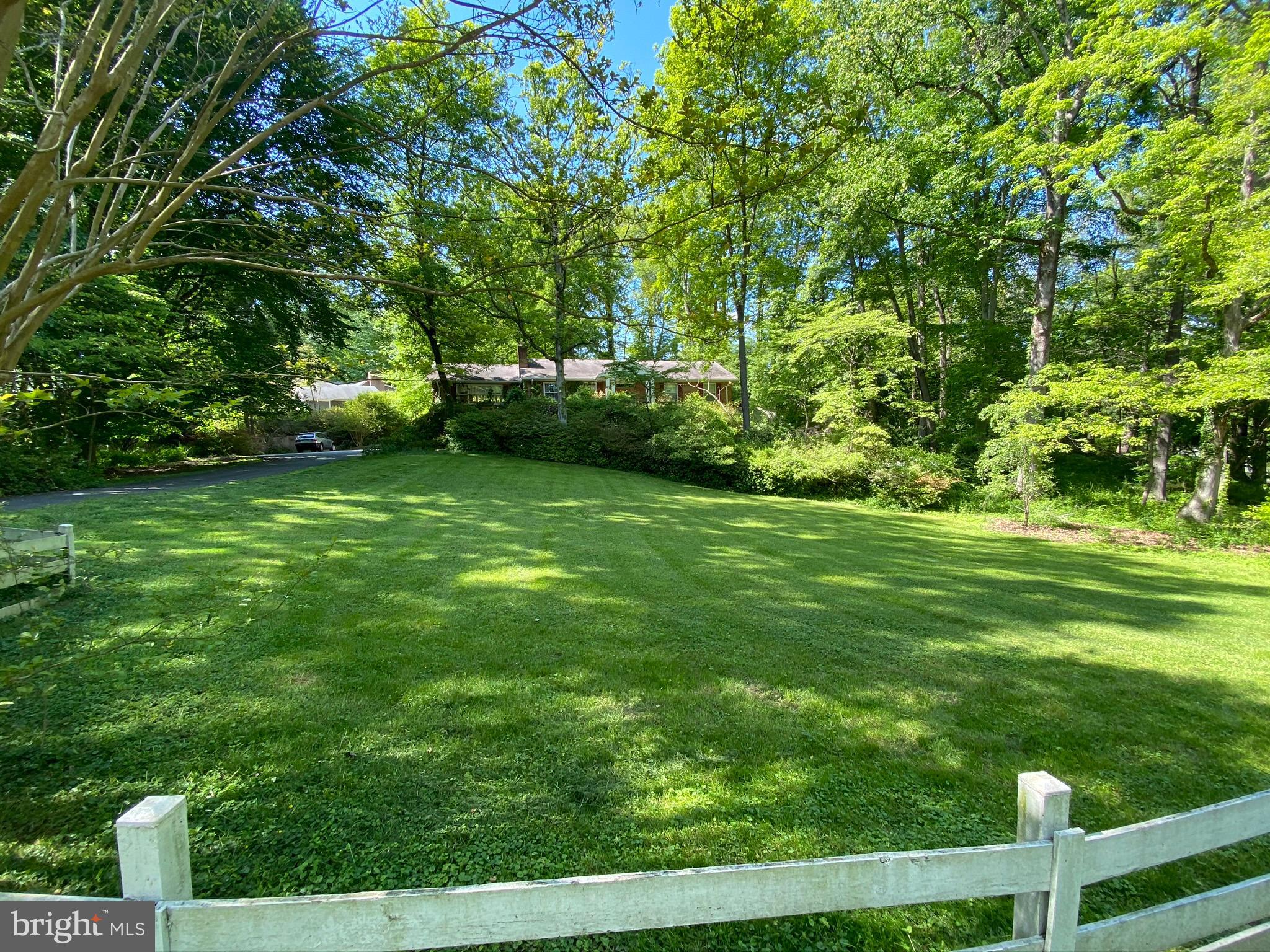 Priced to sell! Beautiful 1.25 Acre Lot located in the exclusive and sought-after neighborhood of Langley Forest. This property is also listed as a residential listing however the value is in the land. The house is vacant and is considered to be a tear-down. Comps of newer homes on the Wemberly Way as high as $3.9 Million.  Bring your builder/developer, designs and walk the perfect lot for your new home. Enjoy the quiet natural surroundings without sacrificing convenience. Close to GW Memorial Parkway, Georgetown Pike, I-495 & I-66, Dulles Airport, and shopping. Public water and public sewer (gas not connected to the house but available in the neighborhood). The house on the lot is vacant, but unavailable for viewing (Value is in the land). No lockbox.  Please contact listing agent before walking lot and for more information.  If you absolutely must see inside, let's discuss.Also available as Residential Listing: VAFX1128344