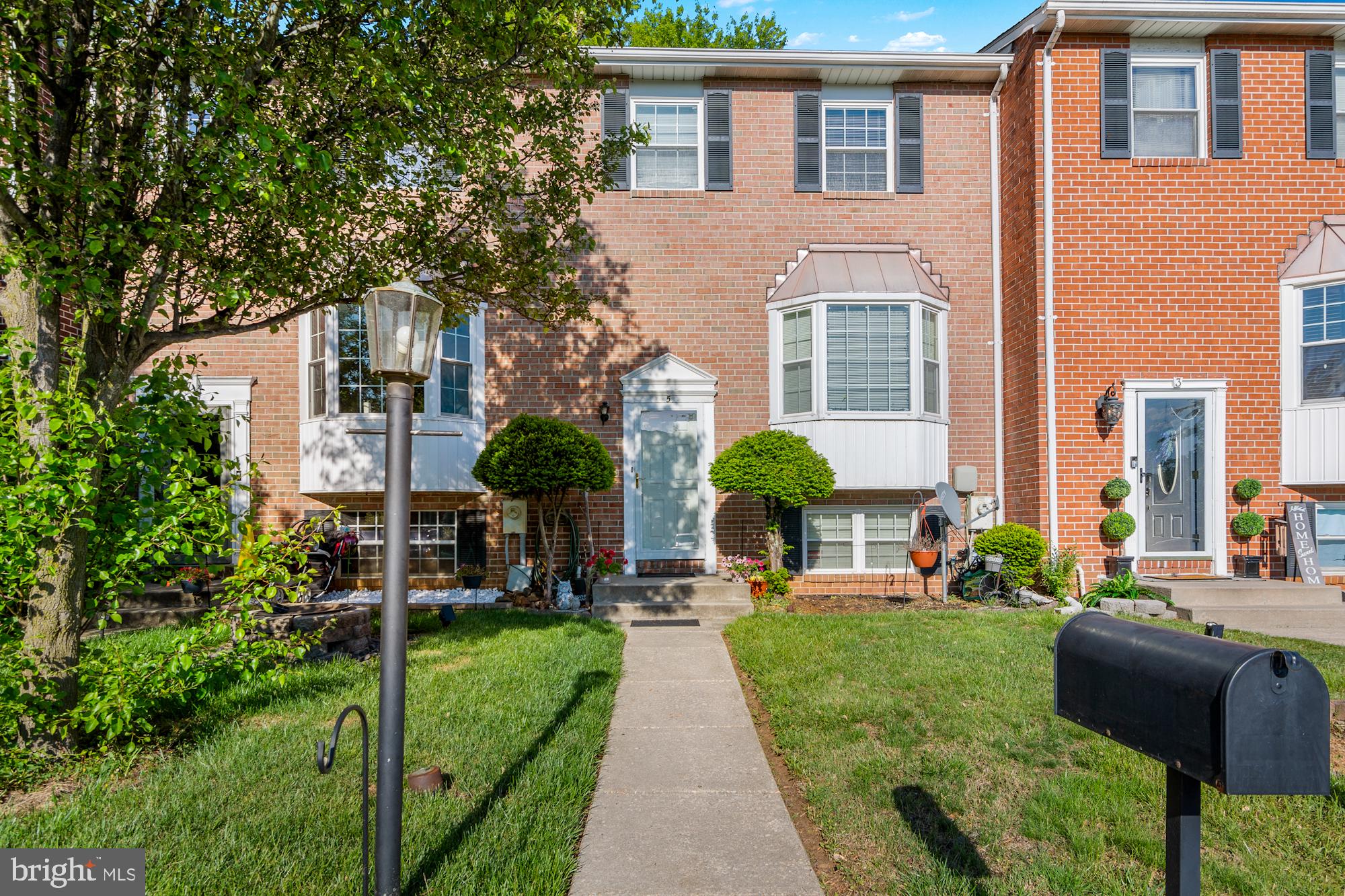Great new listing in Oakhurst.  Value priced with room to improve and build equity!!  This home is sold subject to existing lease and is currently rented through 1/31/27.  Split foyer townhome with brick front and bay window features just a few steps up to the main level with living room, dining room and eat-in kitchen.  French doors off the living room to a large rear deck.  The upper level features three bedrooms and a full bath.  On the lower level, you will find a family room, fourth bedroom or office, plus a full bath.  Lower level has door to rear patio. Separate area for laundry.  Home has had several improvements over the last few years including roof, front door, storm door, and HVAC.  Great Nottingham location convenient to everything!  No HOA fees.