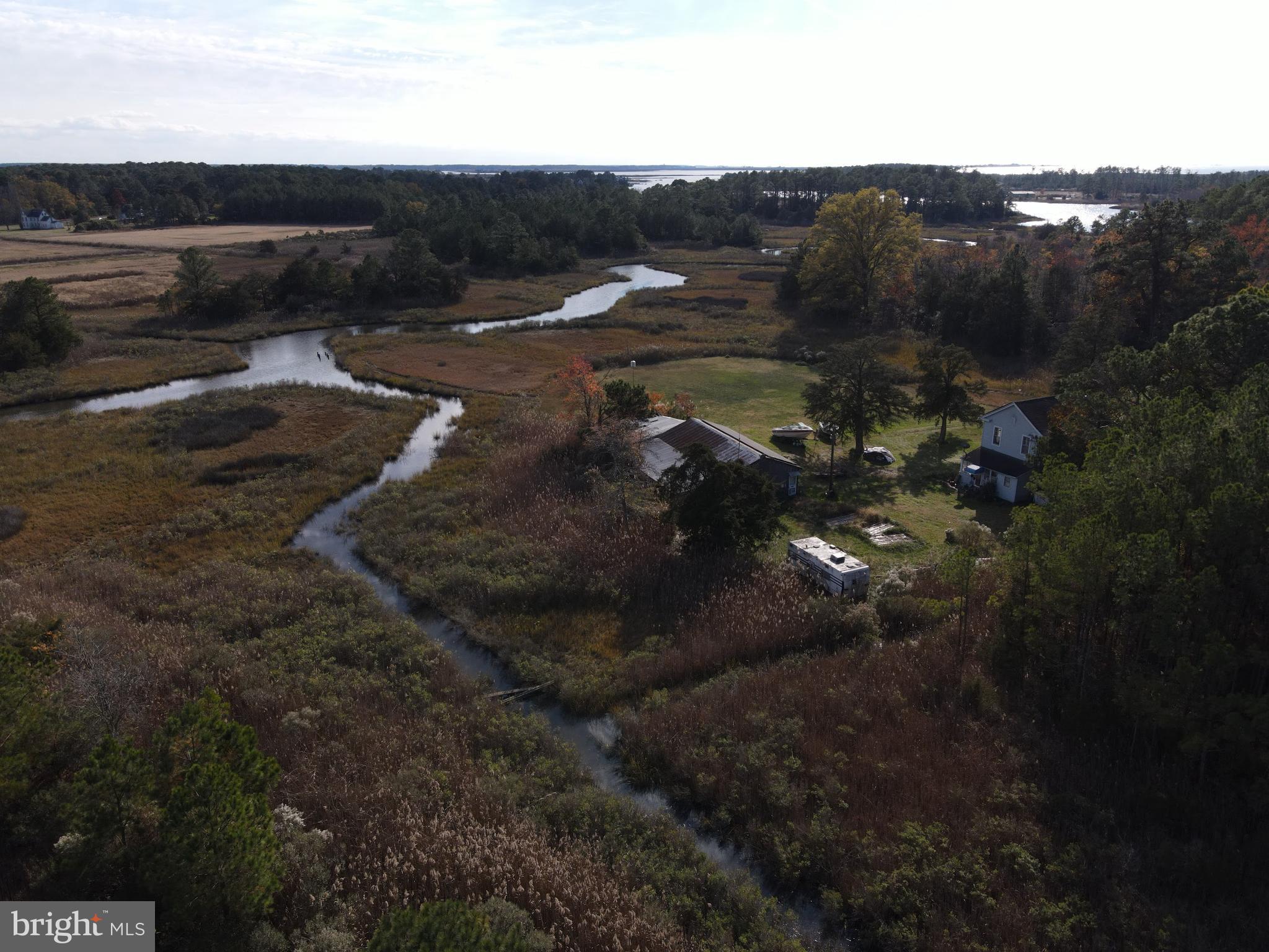 Very unique water front property in eastern shore, near Princess Ann and Deal Island. It is on a tidal creek and small boart/kayak can be launched, the remnant of a small pier is still there, public boat ramp is also close by.

The house has 3 bed 1 bath upstairs and 1 bed 1 bath on main floor. The barn is idea for hanging out and social.

House needs work, but previous owner has been living there for 15 years. My plan is to fix it up, however, price will be higher. I am open to other arrangements for renovation that makes sense.

Property is 19.5 acres so plenty of space to wander around. Mostly wooded with some salt water bushes. It is on a dead end street with no neighbors far away.

CURRENTLY TENANT OCCUPIED, DO NOT GO WITHOUT CONFIRMED APPOINTMENT.