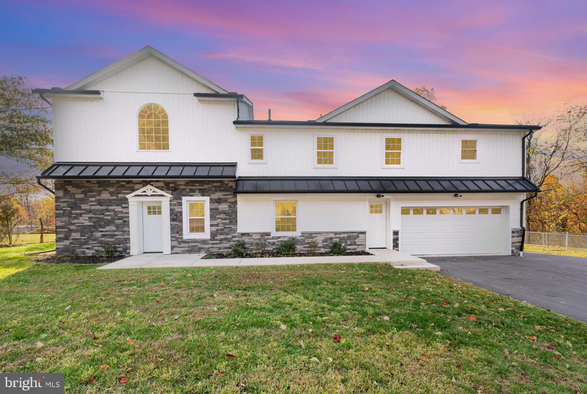 Custom Renovated Luxury Home on a Private Wooded Lot in Cumberland Valley School District.  Modern Living Meet Serene Setting in This Multigenerational Home.  Home Offers Bright Open Floor Plan w/ tons of Natural Light.  15 Ft High Ceilings in the Living Room w/ Floor to Ceiling Stone Fireplace.  Custom Chefs Kitchen w/ Gray Shaker Cabinets, Peninsula, Huge Center Island, Quartz Counters, Tile Backsplash & Stainless-Steel Appliances.  Formal Dining Area w/ Custom Columns & Recessed Lighting Throughout.  This Open Concept Living Continues on the Second-Floor w/ Another Family Room & Secondary Full Kitchen.  Huge Primary Bedroom w/ Vaulted Ceilings, Recessed Lighting, Walk in Closet & Primary Bath Offering Huge Tile Shower w/ Glass Enclosure & Stand-Alone Soaking Tub & French Doors Leading to Private Deck.  Updates Include New Asphalt Roof w/ Metal Accents, New Siding, 3 New Decks, New Driveway, New Luxury Vinyl Plank Throughout, New Fa/Gas Dual Zone Heating, New Heat Pump w/ Central Air, New Water Heater & New Garage Doors.  Private Fenced in Rear Yard Perfect for Entertainment or Relaxation.  Make This Your Home Today!