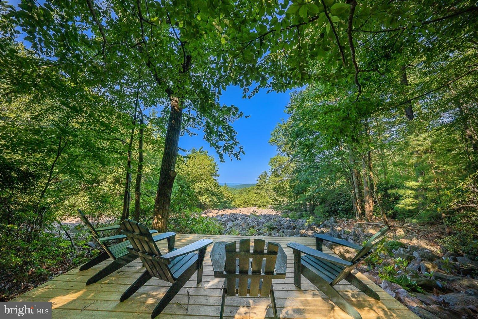 Graystones Preserve | Northeastern Pennsylvania

Discover an extraordinary opportunity at Graystones Preserve - an exclusive, private 3,798-acre mountain sanctuary designed for a limited number of owners seeking unmatched beauty, privacy, and recreation. Each buyer acquires a 3- or 12-acre homesite along with shared ownership in one of the largest private preserves in the region.

Set amid rolling hills and surrounded by protected state lands, these thoughtfully positioned homesites offer sweeping 25-mile view corridors, river and valley vistas, and direct access to a pristine 3.5-mile trout stream with waterfalls, native wildlife, and soaring bald eagles. Every homesite is designed for independence and comfort, with private well and septic systems, robust internet, and year-round accessibility.

Graystones Preserve blends rugged natural beauty with refined amenities. Planned features include a private lodge with great room and entertainment kitchen, master guest suites, a resort-style pool overlooking panoramic views, a 200-acre open meadow, organic gardens, fitness facility, gun club, and fly-fishing and outdoor recreation resources. Owners will also enjoy optional services such as property maintenance, housekeeping, grocery delivery, and private chefs.

With miles of trails for hiking, biking, and ATV use, the preserve offers a rare balance of seclusion and connection - an ideal retreat for families and like-minded outdoor enthusiasts. Conveniently located just 90 minutes from Philadelphia and approximately two hours from New York City, Graystones Preserve is both a peaceful escape and an accessible gathering place.

Homesites available:

3-acre parcels: $595,000–$675,000
12-acre parcels: $750,000–$975,000
A once-in-a-generation opportunity to own within a legacy property - over five times the size of Central Park - where nature, privacy, and luxury coexist.

Taxes TBD.