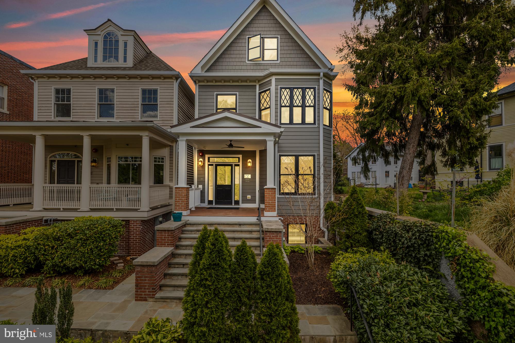 Perched above the trees in Historic Mount Pleasant, welcome to this beautifully finished 3 bed, 3 bath, and 2 half-bath condo with parking that truly lives like a house. Tucked up off the street with a covered front porch, the chic, like-new interior spans an estimated 2,300 sq. ft. and features beautiful hardwood floors, 9-foot ceilings, and tons of storage space. Upon entering, the primary bedroom sits at the front of the home with southern exposures, a large walk-in closet with custom shelving, and a spa-like en-suite bathroom with a double vanity and walk-in shower. Down the hall, the main living area offers versatile space for a large dining table and sectional seating. Host and entertain with ease in the chef's kitchen with abundant cabinet storage and a large dine-at island with seating for four. High-end stainless steel kitchen appliances, a beverage center, a newly finished mud room, and a powder room complete this floor.

Downstairs on the garden level, enjoy a quiet and serene space to relax and unwind. A large second bedroom with room for 2 beds and a workstation offers comfortable space for visitors or guests complete with an en-suite bath and soaking tub. The incredibly spacious downstairs rec room is ideal for movie nights or game day, complete with a wet bar with disposal, second wine fridge, second dishwasher, and custom cabinetry! A second powder room and huge closet are located off the den. Toward the back of the home, you’ll find the third bedroom with another walk-in closet and an en-suite bath with a soaking tub. The newly updated laundry room provides a side by side washer/dryer and custom cabinets for storage. Current owners have made tremendous updates including the kitchen mudroom addition and customized Elfa solutions in all closets. 

Outdoor space abounds at this house-like condo. Walk directly out the glass kitchen doors to your large flagstone patio, hang on the front porch to listen to the lions from the National Zoo and watch the sunset overlooking the trees, or open up your lower level entertaining space to the lower level terrace. Stroll up to Mount Pleasant Street for coffee, yoga, shopping, and dining, or get outdoors on the trails of Rock Creek Park or with a visit to the National Zoo. Rated "Very Walkable", "Excellent for Transit", and a "Biker’s Paradise" by DC Walk Score. Move right into this truly amazing Mount Pleasant home.