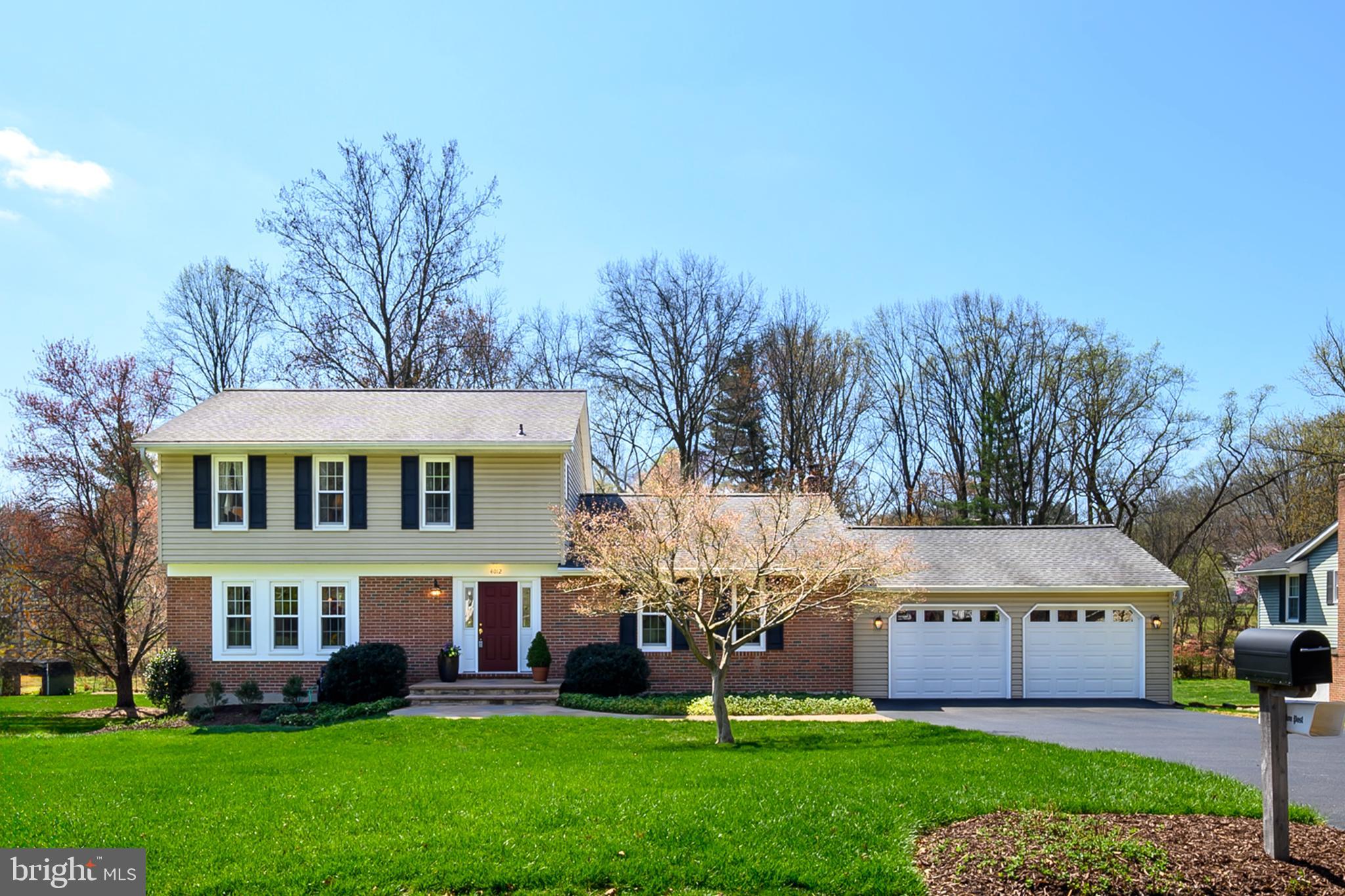 Prepare to be thoroughly impressed!  This exquisite home has been thoughtfully improved & maintained, situated on an ideal, flat lot in a sought after, convenient location close to top notch schools, Centennial Park +  incredible Ellicott City & Columbia amenities! The stunning kitchen renovation & adjoining, expansive family room with cozy fireplace is the true heart of this home - opening to the  screened porch & deck where it will be a joy to spend countless hours relaxing & sharing meals with friends & family. Formal living & dining rooms offer a quiet retreat & additional areas to entertain. Perfect main level laundry room & main floor study complement today's lifestyle!  Four upper level bedrooms all have ceiling fans; the primary include an ensuite bath. The unfinished walkout lower level complete with work benches offers versatility for crafts, hobbies, storage, or improve for your specific needs & style.  The oversized garage has an epoxy coated floor, 9' doors for comfortable access, & plenty of room for additional storage. Rest easy knowing these costly updates are already done for you: kitchen remodel (2022), kitchen dishwasher/microwave/range (2021), efficient replacement windows (2017), roof (2014), gas water heater (2024), HVAC (2014), handsome stone entry walk & front porch (2017), additional insulation added into attic (2015), lower level sliding glass door (2015), garage doors (2013).