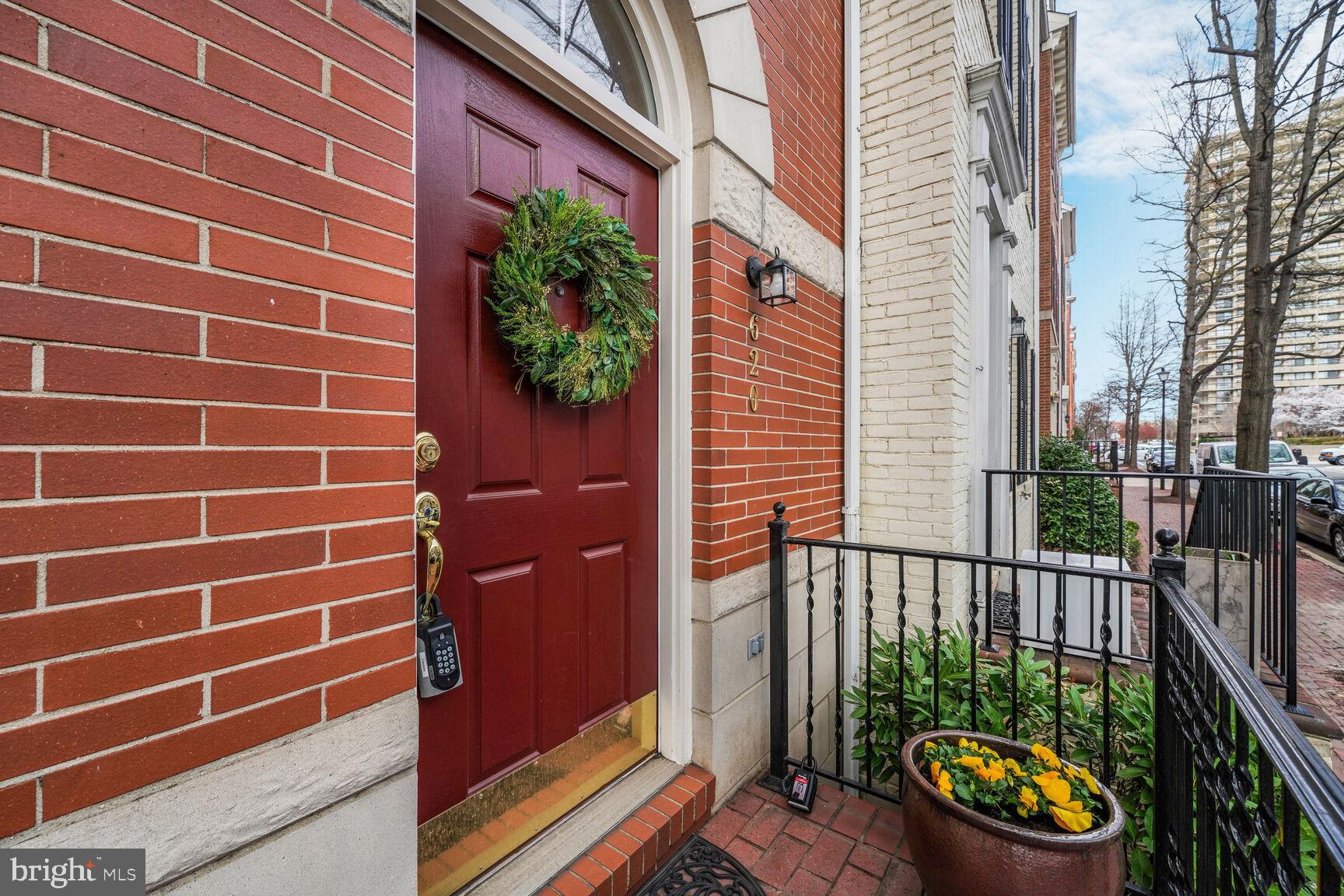 Welcome home to this spacious and elegant townhome in the heart of Old Town Alexandria, offering over 2,000 square feet of living space across four finished levels. The main level is designed for both entertaining and everyday living, boasting a bright and open floor plan. The living room, highlighted by a charming bay window, flows effortlessly into the dining area. The gourmet kitchen features stainless steel appliances, granite countertops, and a cozy breakfast area with a bay window. Overlooking the kitchen is a flexible space—perfect as a family room or additional dining area—leading out to the rear deck.

The first upper level is home to a luxurious primary suite with a generous walk-in closet and an expansive ensuite bath. A second bedroom, also featuring a private full bath and walk-in closet, completes this level, along with a conveniently located laundry area. On the top level, you'll find a spacious third bedroom with its own private bath and multiple closets, offering a private retreat for guests or additional living space. The lower entry level is complete with a home office/flex space, a powder room, ample storage, and garage access.

Situated in a prime Old Town location, this home is just blocks from Trader Joe’s, Harris Teeter, and a vibrant selection of restaurants. Enjoy scenic walks at Oronoco Bay Park, and benefit from easy access to I-495 and National Airport (DCA). Commuting is effortless with a bus stop less than a block away and the King St Metro Station just over a mile from your door.