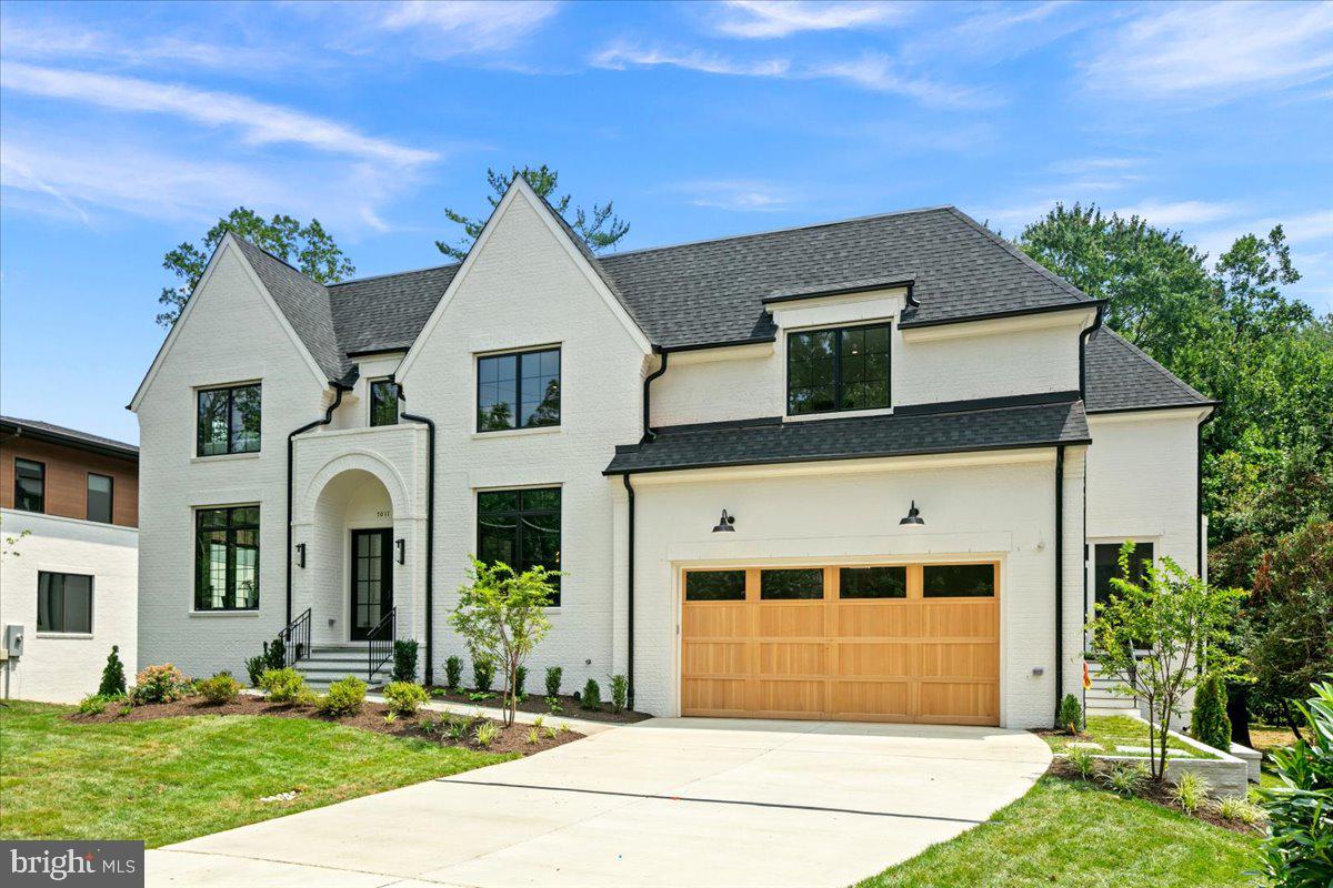 This brand-new, fully custom 5BR/5BA/3HB all-brick English cottage residence is built by McLean-based Focal Point Homes and designed by the acclaimed Harrison Design. Set on a .55-acre lot backing to private protected parkland, the home offers a rare balance of architectural distinction and a tranquil natural setting, all within walking distance of Churchill Elementary School and downtown McLean. Direct access to a county-maintained trail system along Dead Run Stream connects the property to the newly renovated McLean Central Park, community center, and library, creating a seamless relationship between home and landscape. The park-like setting can be enjoyed from the covered screened porch, complete with a fireplace and in-ceiling heaters, or from the expansive deck overlooking the private backyard. The interior reflects thoughtful craftsmanship and restrained elegance, featuring two fireplaces, an elevator, sauna, fitness room, scullery kitchen, Andersen casement windows, white oak hardwood flooring, and a built-in speaker system. The luxury kitchen is appointed with Wolf, Sub-Zero, and BlueStar appliances, alongside many other refined details designed for comfort and longevity. School pyramid: Langley High School, Cooper Middle School, Churchill Elementary School.