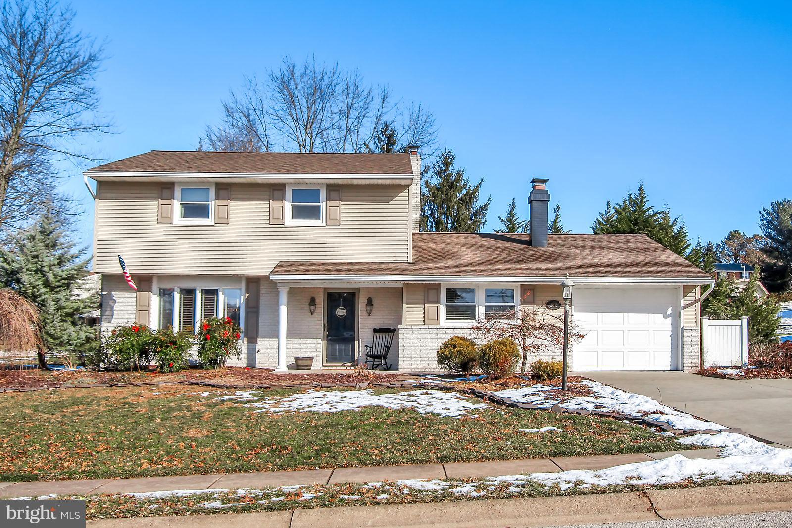 If you've been hunting for the perfect house, stop chasing the homes you won't like and take a look at this home in popular Fox Chase.  The kitchen welcomes you with the new tile flooring, granite countertops.  A cozy corner banquette with custom storage/seating bench is the perfect place to sip coffee and start your day.  The formal dining room has wood flooring, elegant crown molding, chair rail and a ceiling medallion that showcases a beautiful chandelier.  The family room features new carpeting, built ins, and a fabulous rustic brick fireplace.  The powder room was recently beautifully renovated.  The second floor features a large master bedroom with a private access to the full bath.  The accent wall is so on-trend!  The exterior features a grilling shed that is perfect for hosting parties or used for storage.  The basement was waterproofed and is ready for your finishing touch!  This home has been lovingly updated and maintained .