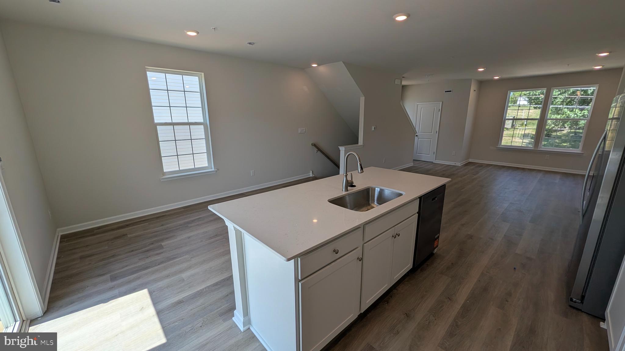 MOVE IN BEFORE THE NEW SCHOOL YEAR! Welcome to Spring Garden Meadows!  The Norris by D.R. Horton is a stunning new construction 3-story End Unit with a floorplan featuring 1,763 sq.ft. of open living space, 3 bedrooms, 2.5 baths, and a 2-car garage. Thoughtful design and modern luxury are uniquely embodied in this townhome plan. The Norris offers a spacious main level eat-in kitchen with recessed lighting, and a generous island providing plenty of cooking and entertaining space. The upper level boasts a private laundry closet and stylish owner’s suite, complete with a walk-in closet and dual vanities. The lower level features a finished recreation room or guest suite, ideal for additional storage or entertaining.
* Photos are representative and may vary.  Finishes may vary.
* All room dimensions are estimated.
* ALL OPEN HOUSES BEGIN AT THE MODEL HOME. PLEASE CHECK IN WITH ON-SITE SALES REPRESENTATIVE.