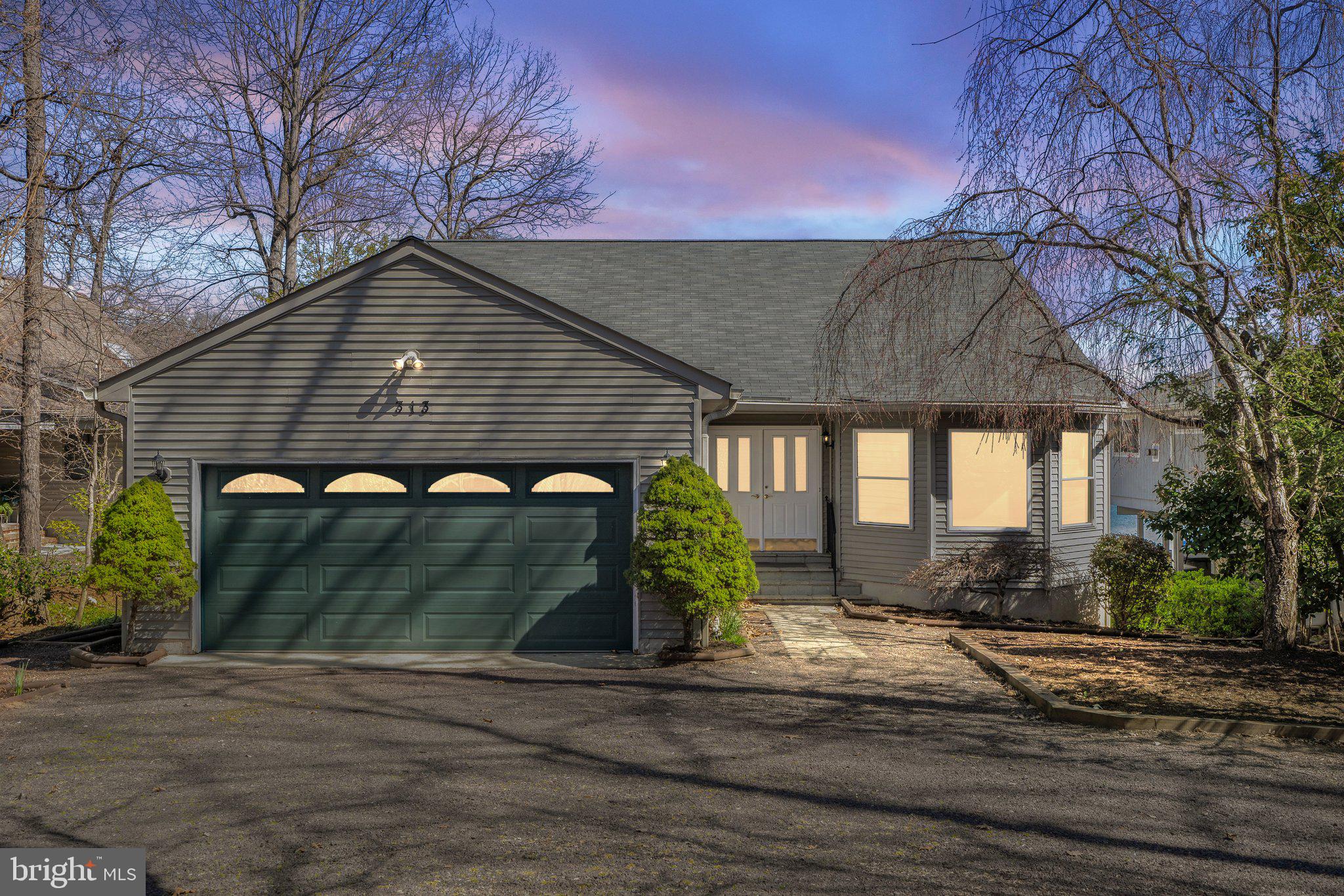 Welcome to your new lake front home on 313 Wakefield Drive also known as May's Landing. Experience the privacy, beauty and peacefulness of lake living in this 5 bedroom, 3 full bathroom, Rancher home that is located in the sought after Lake of the Woods community. With 75 plus feet of  waterfront, this gem was perfectly designed by  the owner. This property has been well loved and maintained by one original owner.  This home has offered years of relaxation, memory making gathering space for multi-generations. From the upper and lower deck and dock you can enjoy the Fourth of July fireworks show.  Enjoy a beautiful sunrise on your back screened porch with a cup of coffee in hand. This property offers one of the best locations on the lake.  The  main level offers: 3 bedrooms, 2 large living rooms, 1 living room has a boasting stone fireplace, bright natural light filled piano room, semi-open concept living, eat in kitchen, screened in porch with an additional oversized deck. The lower level expands into a oversized living space, featuring two additional bedrooms, a full bathroom, office, pool table room/playroom, storage for all your lake toys and so much more. Utility room offers a large unfinished area with attached workshop space. The lakefront location for this property is extremely sought after in the Lake of the Woods community! Enjoy lake life at its finest here at 313 Wakefield Drive. 
Lake of the Woods community offers a  lakeside lifestyle with an array of amenities to enjoy. Over a 500 acre lake, perfect for fishing, water sports, or sunset cruise on the lake. Whether you are a golfer,  pickleball player, horse riding enthusiast this community has so much to offer! This home is perfect as your primary or second home to enjoy the beauty of Lake of the Woods. The Lake of the Woods is conveniently located for all of your needs to enjoy your time on the lake. You do not want to miss out on this opportunity.