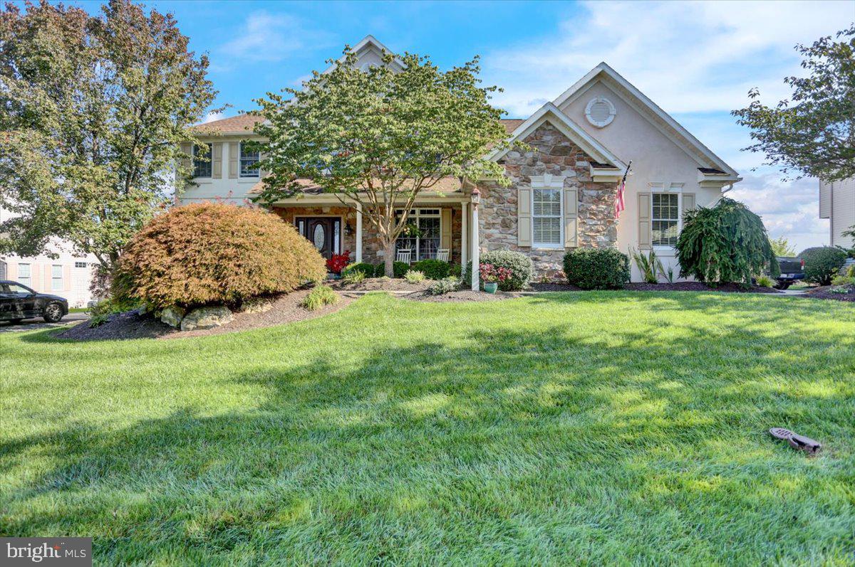 Welcome to 2920 Cotswold Road. This stunning four-bedroom, two-story home with exceptional curb appeal is located in the Reedy Run community within the Wilson School District. With a spacious open foyer leading to various living areas, this home offers both elegance and functionality. Upon entering, you'll be greeted by a formal living room and a formal dining room featuring a tray ceiling, adding a touch of sophistication to your gatherings. The first floor also includes an office, providing a private and convenient space for work or study. The family room is a highlight of the home, boasting a vaulted ceiling and a cozy gas fireplace, creating a warm and inviting atmosphere for relaxation and entertainment. The gorgeous white kitchen is a chef's dream, featuring stainless steel appliances, a center island, recessed lights, and a breakfast area. The kitchen is both stylish and functional, providing ample space for meal preparation and casual dining. The first floor also includes a laundry room and a half bath, adding convenience to your daily routines. Upstairs you will find 4 spacious bedrooms, each offering comfort and privacy. The primary bedroom suite is a true retreat, featuring a sitting room and a remodeled bath with a whirlpool tub and a glass door shower. This luxurious space provides a serene escape for relaxation and rejuvenation. The finished basement adds an impressive 1400 square feet of living area to this already spacious home. It boasts a family room with a stone accent wall, a media room for movie nights, an exercise room for staying fit, a half bath, and a convenient kitchenette. This basement is perfect for entertaining guests or creating a separate living space for extended family or guests. Additional features of this home include a three-car side entry garage, providing ample parking and storage options. The two-tier deck overlooks the fenced-in yard, offering a private outdoor space for enjoying the fresh air and hosting gatherings. This home also boasts all new exterior doors, central air conditioning, gas fireplace, hardwood flooring, and a charming front porch. With its spacious layout, elegant finishes, and desirable location, this four-bedroom, two-story home in Reedy Run is a true gem. Don't miss the opportunity to make this house your home. Schedule a viewing today and experience the comfort and luxury it has to offer.