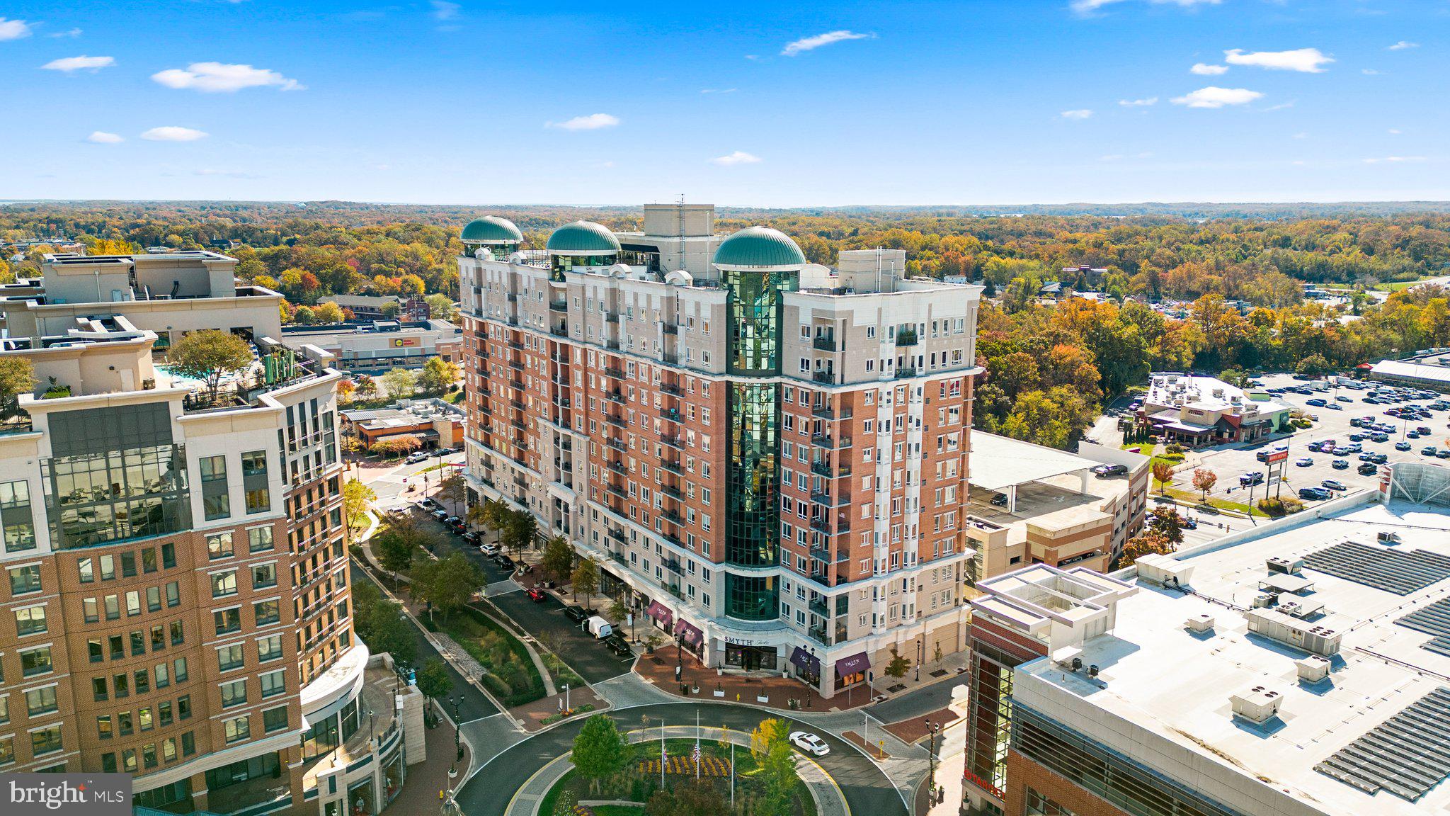 This exceptional 5th-floor condo offers a one-of-a-kind, unique floor plan with breathtaking panoramic views and an abundance of natural light from its sunny southern exposure. Featuring two generously sized bedrooms with expansive closets, this upscale residence combines comfort and style. Inside, you’ll find beautiful hardwood floors, soaring 10-foot ceilings, and elegant granite countertops throughout. The freshly painted interiors are complemented by custom window treatments that add both privacy and sophistication. Step outside to your private balcony and enjoy sweeping views of the surrounding area. Key Features: 2 spacious bedrooms with large closets Gorgeous hardwood floors Soaring 10-ft ceilings for an open, airy feel Granite countertops in kitchen and baths Freshly painted with custom window treatments Private balcony with stunning views Assigned parking space for convenience Building Amenities: Rooftop pool with panoramic vistas State-of-the-art fitness center Elegant club rooms for gatherings and relaxation Concierge service for a luxurious living experience Ideally located in the vibrant Annapolis Towne Centre, this condo puts you within walking distance of premier shopping, dining, and entertainment options. Whether you're enjoying a meal at one of the area's finest restaurants or exploring local boutiques, everything you need is just moments away. This is a must-see home that blends modern living with the best of Annapolis! Don't miss out on the chance to call this spectacular property yours.