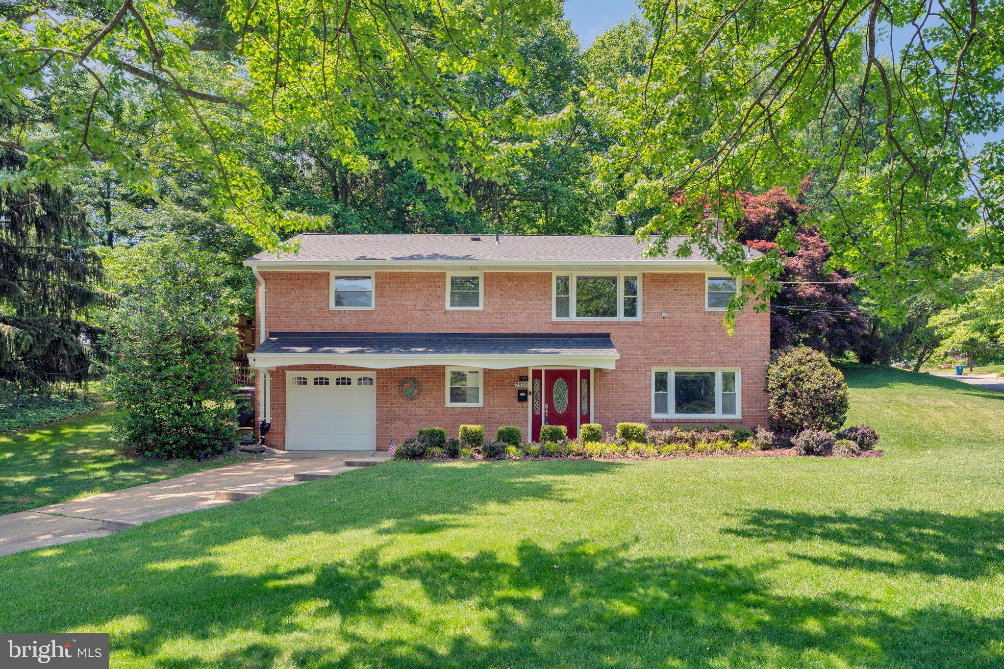 Gorgeous setting for this 4 BR/3 BA home, ideally located near Lake Accotink Park, The St. James, and major commuter routes. Highlights include an updated kitchen, a formal living room and a cozy family room—each with its own gas fireplace—an expansive yard, and a one-car garage.

The welcoming foyer opens to a spacious recreation room on the lower level, featuring warm neutral carpeting and an inviting gas fireplace accented by slate and stonework. This level also offers a generously sized bedroom, a full bath with a tub/shower combination, and a well-organized laundry area.

Upstairs, you’ll find three additional bedrooms, including the primary suite with its own private bath, as well as a second full hall bath. The open living, dining, and kitchen layout provides an ideal gathering space, enhanced by a second gas fireplace in the living room. The kitchen features granite countertops, stainless steel appliances, and a breakfast bar, with easy access from the living room to the deck and your outdoor oasis.

Set on a corner lot, the backyard feels like a private retreat, offering charming wooded views framed by wood fencing—perfect for relaxing or entertaining. Recent updates add welcome peace of mind, with the roof and gutters replaced this year and the HVAC system upgraded in 2021.

Conveniently close to parks, schools, dining, shopping, and major commuter routes, this inviting sanctuary is ready to welcome you home.