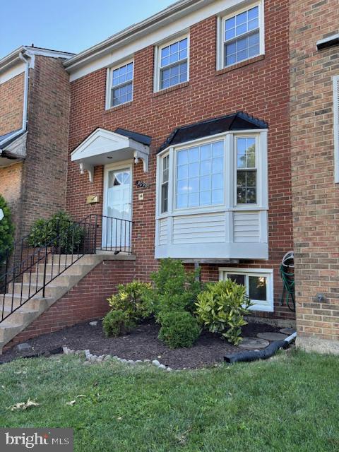 Beautifully & completely updated 3-lvl ALL BRICK TH.  3 BRs + multiple-use room in basement that could be an office, guest room, craft room, study next to a full bath.  Lower-level has a new Luxury Plank Floors, a new bathroom, Family Room with FP & wet bar and French door to fenced patio, semi-finished laundry rm w/W&Dryer.  Main Level  has New Luxury Plank Floors thru-out, Eat-in Kitchen w/Bay Window, granite counters & stainless steel appliances (brand-new stove, new Frig, DW & Disposal 2024 or 2025, big LR, separate DR; upper level & stairs new w-to-w carpet, renovated  Primary & Hall Bathrooms. New Ceiling Fans in all BRs & Kitchen. New storm doors front and LL Back.  2-inch white wood blinds throughout.  Roof 2019; Windows approx. 2015.  New paint inside.  MOVE-IN Ready.  Tot Lot across the quiet street.  Not a thru street.  Windows & gutters just professionally cleaned and ready for Fall.  Quiet neighborhood, yet couple of blocks to grocery, restaurants, Michael's, MicroSoft Center and just a little further to Vienna Metro, Mosaic District.  OPEN SUNDAY, July 5, 2-4 pm.  COME BY & BUY.  OWNER/LISTER LICENSED RE AGENT