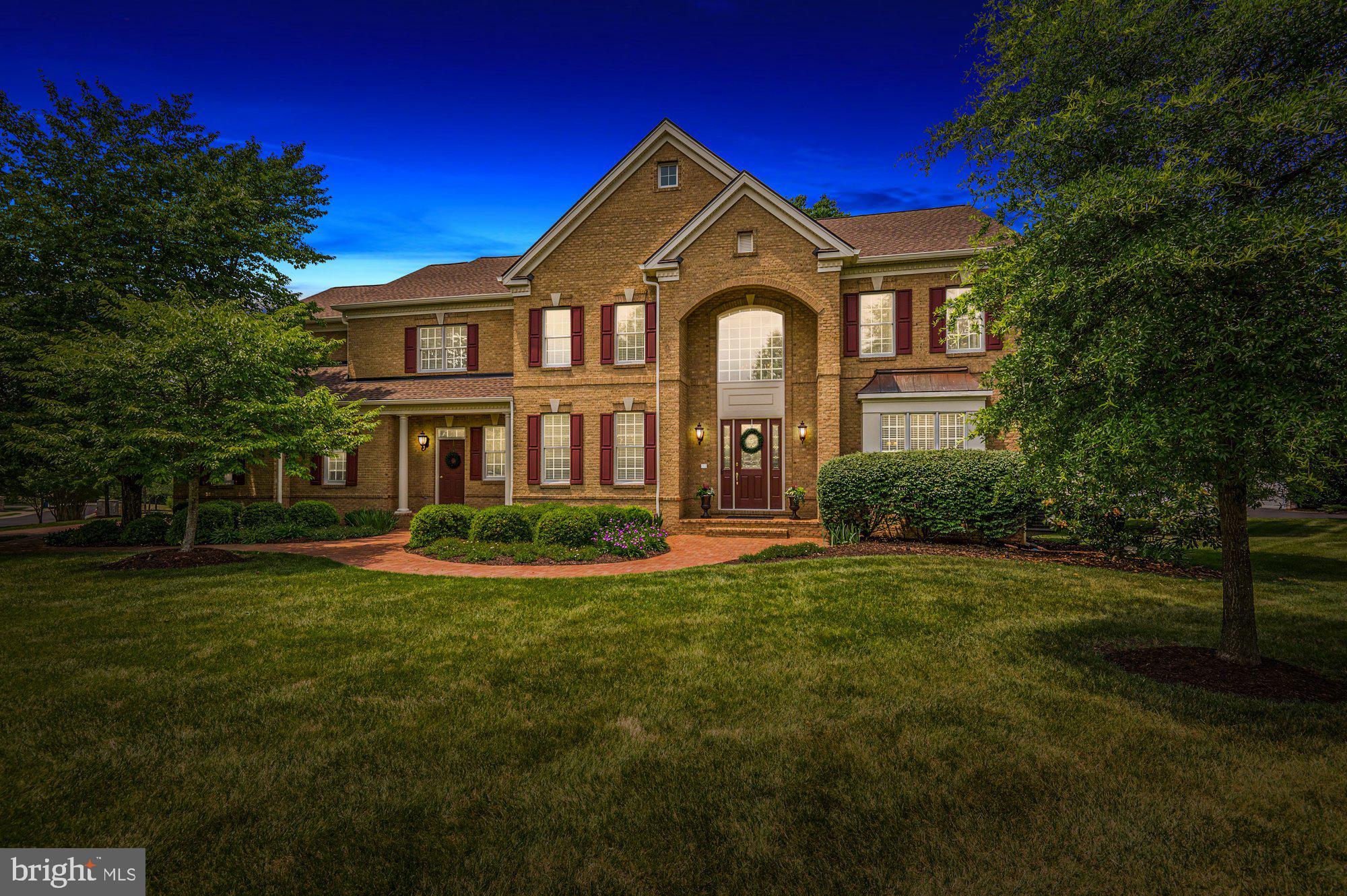 Masters Series Home with Signature Series Specifications and Finishes!  This Melrose Model features 10' Ceilings and 8' Doors on the Main Level!  You'll Love the Two Story Great Room with Beamed Ceiling and Stone Fireplace!  Entertain in the Chef's Kitchen with Palladian Extension and Expanded Breakfast Area!  Relax and Retreat to the Sunroom with Skylights!  Formally Gather in the Expansive Living and Dining Rooms that feature Tray Ceilings!  Enhanced Moldings Throughout!  Marble Flooring in the Two Story Foyer with Curved Staircase!  The Huge Primary Bedroom features a Private Sitting Room that could also be a Great Nursery or Office and a Luxury Bath!  Throw a Party in the Expansive Lower Level which includes a Large Wet Bar, Game Area, TV Zone, Exercise Room and Den/Bedroom!  If You Enjoy the Great Outdoors, take a seat and Enjoy the Privacy of the Deck, Backing to Trees! Two Block from the Recreation Center (Pools, Park, Playground, Tennis/Basketball/Volleyball Courts)!
