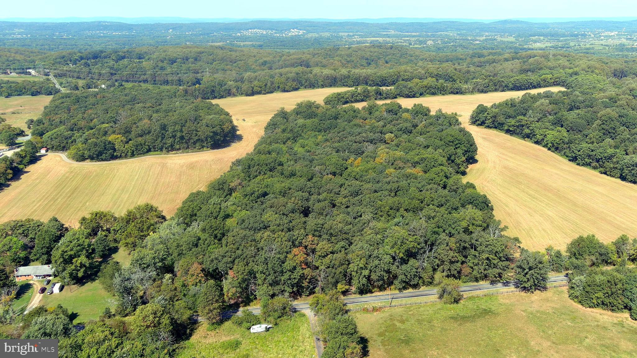 Beautiful and private 136.2 gently rolling acres in the western Montgomery County Agricultural Reserve. This property offers a mix of cleared farmland (50%) and forest with excellent road access along both Whites Ferry Rd and Martinsburg Rd.  There are remnants of a home on the property. AR Zoning provides potential for up to five residential lots. Just minutes from recreational opportunities along the Potomac River and the lovely small town of Poolesville that offers some of the highest rated schools in the state. The main entrance to the property is on Whites Ferry Rd near the intersection with Elmer School Rd. Please do not enter the property without prior approval.