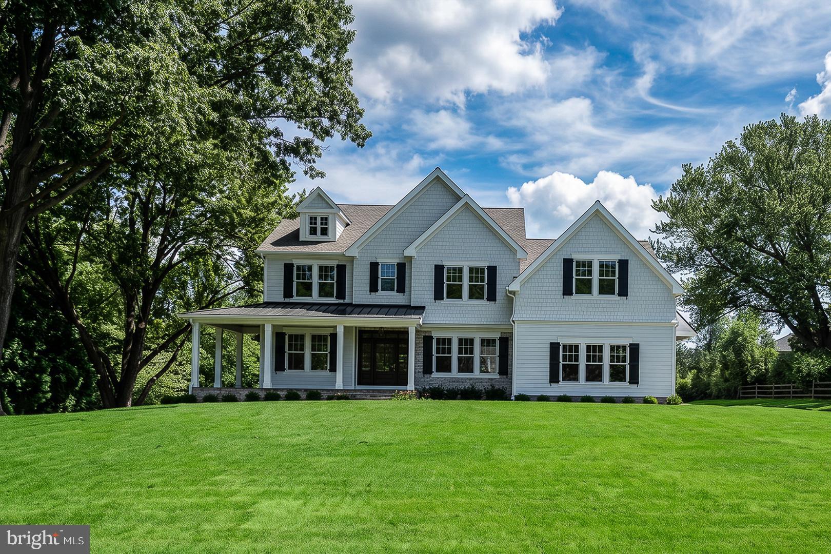 Opportunities to own a newly constructed custom home of this caliber in Easttown Township are exceptionally rare. Welcome to 2074 Fox Creek, a remarkable estate by Top Notch Custom Homes, beautifully situated on a picturesque 1.1-acre homesite in one of the Main Line's most sought-after locations.

Offering over 5,000 square feet of thoughtfully designed living space above grade, this exceptional residence blends timeless architecture, superior craftsmanship, and the modern amenities today's luxury buyers demand. Designed for both comfortable daily living and sophisticated entertaining, the home features five generously sized bedrooms, five full baths, two half baths, dual laundry rooms, soaring 10-foot ceilings on the main level, and 9-foot ceilings on the second floor.

The heart of the home is a stunning chef's kitchen outfitted with premium Wolf, Sub-Zero, and Cove appliances, marble countertops, custom cabinetry, and an expansive layout ideal for gathering with family and friends. Throughout the home, buyers will appreciate the attention to detail, including a custom mahogany front entry door, site-finished hardwood flooring, Andersen windows, Hardie Plank siding, brick veneer accents, designer lighting, and high-end plumbing fixtures.

Additional features include custom closet systems, built-in cubbies, a three-car side-entry garage, and a partially finished walk-up lower level with a full bath, providing outstanding flexibility for recreation, fitness, guest accommodations, or future expansion.

Outdoor living is equally impressive. A welcoming wraparound flagstone front porch sets the tone upon arrival, while the covered rear porch, complete with a wood-burning fireplace and dramatic floor-to-ceiling stone chimney, creates the perfect setting for year-round entertaining and relaxation.

Conveniently located near major commuting routes, upscale shopping and dining, Aronimink Golf Club, Waynesborough Country Club, and The Episcopal Academy, the property is also situated within the award-winning Tredyffrin/Easttown School District.

Current taxes reflect land value only and will be reassessed following settlement. Professional photographs shown are of nearby 1017 Waltham Road, the completed version of this home, which is available for viewing as the model residence.

A rare opportunity to enjoy the benefits of brand-new construction, exceptional craftsmanship, and a premier Main Line location -all without compromise.

***Photos are of the same model home at 2017 Waltham Rd, Berwyn