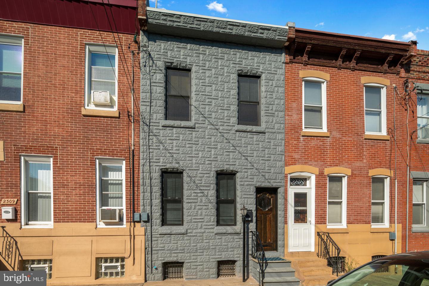 Completely restored from head to toe in Fishtown / Olde Richmond!  This  brick row has open floor plan, custom kitchen w/ 42 inch cabinets, quartz counters, pot filler  + stainless steel package. Full bath on rear of kitchen.  Entire home has refinished hardwood flooring throughout, LED lighting,  central air + heating system, + updated systems.  Master bath w/ custom tile, double vanity, shower + soaker tub.   All new exterior,  new siding, windows, doors, + trim.  Full, finished basement w/ high ceilings, half bath,  storage area + laundry room w/  new washer + dryer.  Maintenance free  yard w/ sitting area. Located on a wide street, close to SEPTA, Center City + numerous Fishtown attractions, cafes, bars + restaurants.