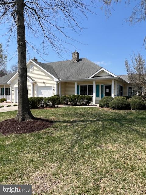Tucked away on a quiet street in this sought after active adult community is this 2 bedroom, 2 bathroom home. Inside you will be welcomed into the large open concept living space that includes a spacious living room with gas fireplace, dining area and kitchen. The kitchen boast solid surface countertops along with a center island. The sunroom expands the living space of the home and offers access to the rear patio. The primary suite includes an ensuite bathroom with double sinks, linen closet, soaking tub and separate shower. There is also a large walk-in closet in the primary suite. The secondary bedroom has a nicely sized closet and has easy access to the full bathroom located across the hall. There is a large laundry room that includes a washer and dryer along with ample closet space providing easy storage space. Additionally you will find an attached 1 car garage and partial attic above. Community amenities include a clubhouse with exercise room, game room, library, indoor pool and more. Come and see all that this community offers and begin enjoying the maintenance free lifestyle today.