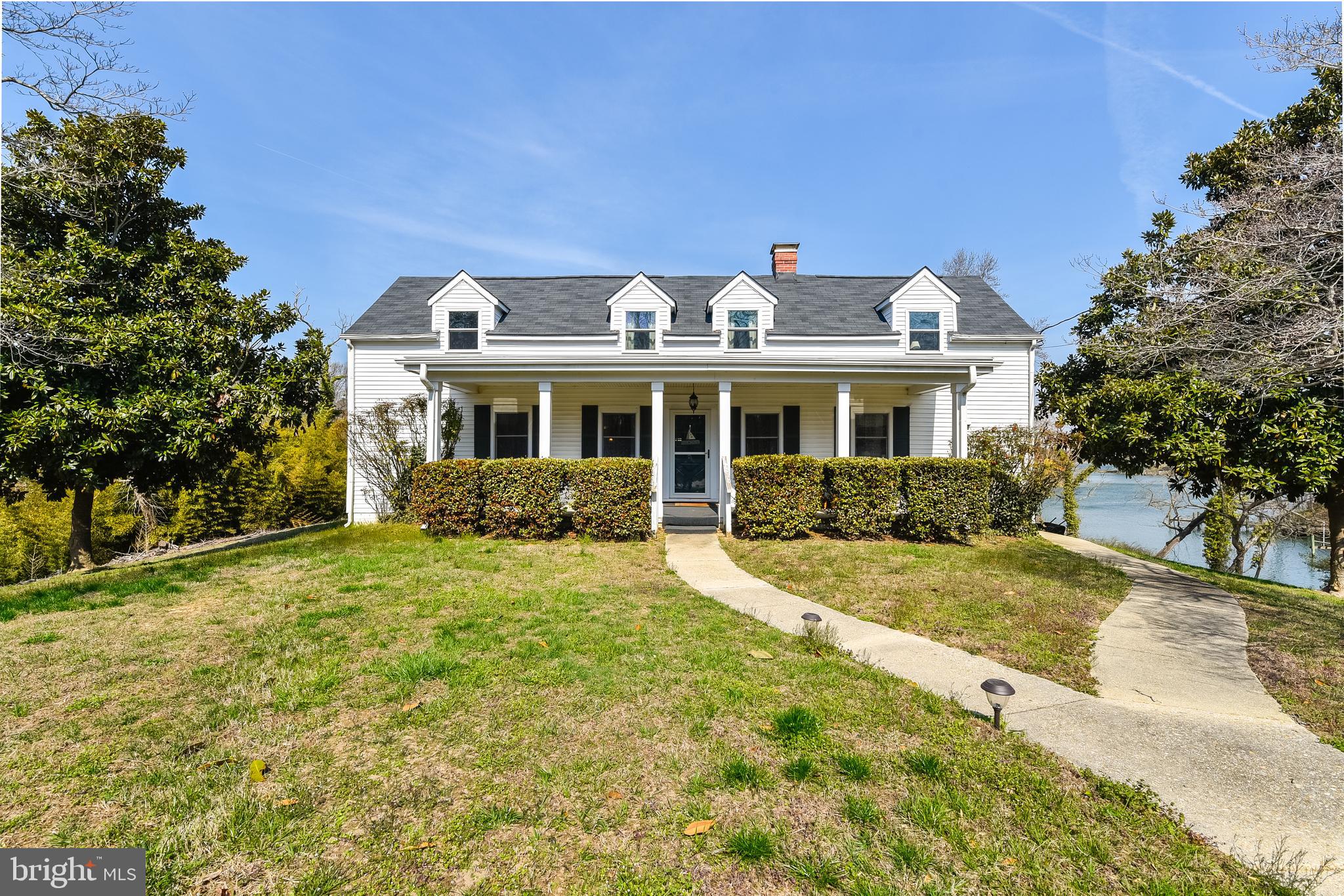**A Rare Opportunity: Quintessential Waterfront Charm with Deep-Water Access on the Patuxent River**

Welcome to 23690 West Patuxent Beach Road, California, Maryland 20619—a property that perfectly captures the essence of waterfront living. This charming original home, built in 1900, offers approximately 700 feet of waterfront and features commanding views of Kingston Creek and/or the Patuxent River from every room.

Meticulously updated in 2021, the home has benefited from significant improvements including updated electric, well, septic, roof, and HVAC systems, ensuring comfortable living while preserving its timeless appeal. The property is being offered furnished and is already generating income, with numerous Airbnb rentals reserved for 2026. Enjoy immediate boat access with a valuable deep-water dock on-site. Whether enjoyed as-is or treated as an ideal canvas to create your masterpiece, this property is truly lovely and unique.

**The Ultimate Private Waterfront Compound**

For an unparalleled family compound opportunity, this listing may be combined with the adjacent property at **23680 West Patuxent Beach Road**. Purchased as a package, you would own a private, four-acre peninsula boasting a total of 1,000 feet of waterfront and a deep-water dock.

The adjacent property, 23680, features a newly constructed custom home built in 2022 by Caruso, offering modern luxury, a grand master suite, a chef's kitchen, a gas fireplace, volume ceilings, 5 bedrooms, and 2.5 baths. Water views are available from every room in both residences.

This unique pairing allows you to live in one home and rent or sell the other. Both properties are sold furnished and have existing Airbnb bookings for 2026. The entire private compound is located just five minutes from the shops and restaurants at Solomon’s Island.

This once-in-a-lifetime opportunity is proudly offered individually or combined with the adjacent home as a compound.