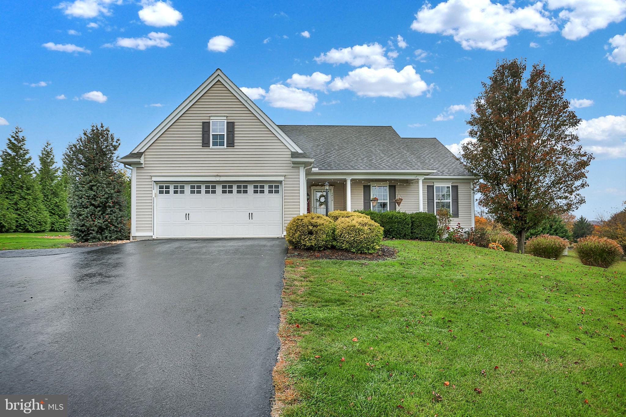 Beautiful home with panoramic, sweeping views of sunrise and sunset and preserved farmland on a sprawling, 1.2 acre lot.  Originally built by Custom Home Group in 2010, this one owner home has been lovingingly cared for and kept up to date.  The living space is an open floor plan featuring a striking kitchen with island, dining area and living room all with updated flooring and under a stunning, cathedral ceiling.   Home was built with wider doors and a lower sink in primary bath for possbile future handicap needs.  Two smaller bedrooms were converted to one large bedroom.   The primary bedroom features a walk-in closet and full private bathroom.  The third bedroom has been relocated to new partially finished basement.   $2,000 credit provided for paint and carpet for 3rd bedroom.  New plumbing, bathroom, electric and drywall completed in the basement level.   Basement renovation doubles the living space!!   The new owner can finish the details to their preference. The rear exterior has a spacious deck surrounded by an easy to maintain lawn and fully grown privacy trees.  A Transco/Williams pipeline easement is located on the north part of the property.  Don't miss out on this unique home on a large, country lot!