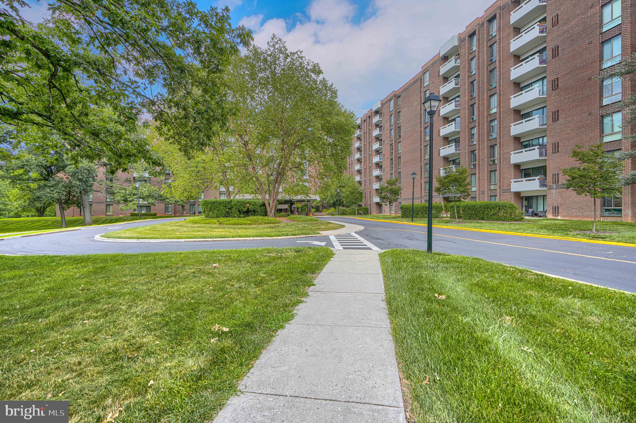 Welcome home to this beautifully renovated 2 bedroom, 2 bath condo (flexible as a 1 bedroom plus den/office) at the sought-after 7 Slade building in Suburban Oaks! No detail was overlooked in this top-to-bottom renovation. Sun-filled and airy, this home features oversized windows and a sliding glass door framing gorgeous views of grass and mature trees. Enjoy your morning coffee on the new semi-private concrete patio — your own quiet outdoor escape. The brand-new eat-in kitchen features crisp white cabinetry, stainless steel Whirlpool appliances, and elegant quartz countertops — a true chef's delight, with additional Butlers entrance for help with the groceries. Both bathrooms have been fully updated, and gorgeous new flooring throughout combines cozy carpet in the bedrooms with durable luxury vinyl plank in the common areas. A dedicated dining room offers the perfect space for entertaining, beautifully illuminated by a new chandelier, while recessed LED lighting and updated vanities and fixtures add a modern touch throughout the unit. Enjoy worry-free living with a monthly condo fee that covers heat, electricity, water, and trash! This secure, doorman building offers an impressive lineup of amenities: a seasonal swimming pool, game room/library, party room, small exercise area, and even guest rooms available for owners hosting visitors. The unit conveys with additional storage space in the basement, and residents enjoy the convenience of a private, gated and fenced parking lot and the option to valet park. Don't miss this move-in-ready gem — schedule your showing today!