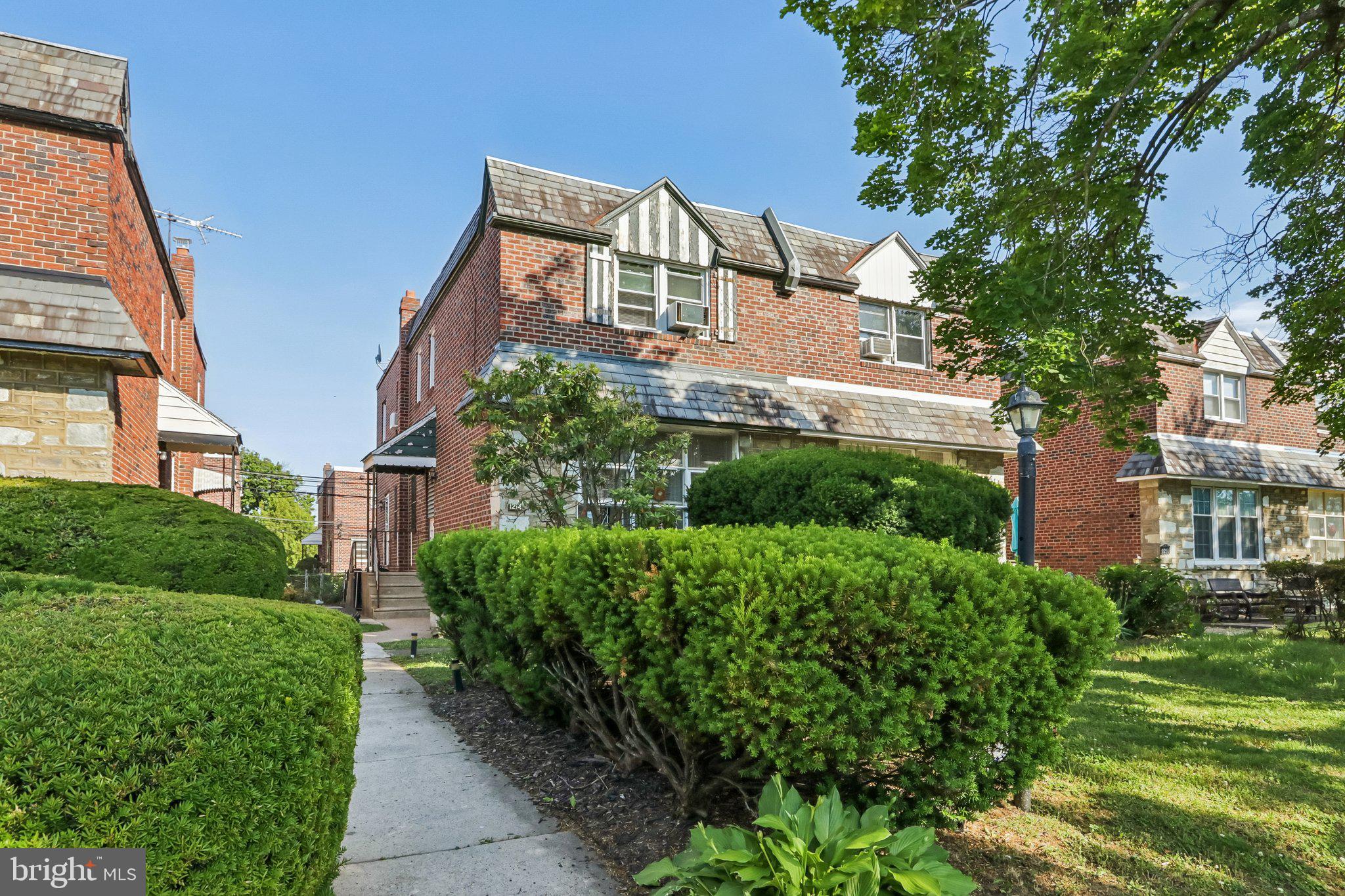 Welcome to 1214 E Sydney Street, a beautifully maintained 3-bedroom, 2-full-bathroom, 2-half-bathroom brick and stone twin home in Philadelphia. Offering a thoughtful layout, hardwood flooring throughout much of the home, and versatile living spaces, this residence is designed for both everyday comfort and entertaining. Step inside to the welcoming foyer featuring hardwood floors and a convenient coat closet. To the right, the bright and spacious living room is filled with natural light from the large triple front window, creating an inviting atmosphere for relaxing or gathering with family and friends. Continuing through the home, you'll find a conveniently located powder room before entering the formal dining room, complete with hardwood floors and a chandelier that provides an elegant setting for meals and special occasions. The kitchen is both functional and stylish, featuring tile flooring, granite countertops, a peninsula with seating, stainless steel appliances, space for a breakfast table, and direct access to the side yard, making indoor-outdoor living a breeze. Upstairs, the primary suite offers hardwood flooring, two closets, and a private en-suite bathroom with tile floors, a step-in shower, and a single sink vanity. Two additional bedrooms, both with hardwood floors, provide flexible space for family, guests, or a home office. A full hall bathroom with tile flooring, a double sink vanity, and a tub/shower combination completes the upper level. The finished lower level expands the home's living space with a versatile recreation or family room, perfect for movie nights, a playroom, or a home gym. This level also includes a second powder room for added convenience. The unfinished portion of the basement houses the home's utilities and provides excellent storage space. Direct access to the attached 1-car garage and driveway further enhances the home's functionality. Conveniently located near local shopping, grocery stores, restaurants, parks, and more, this home also offers quick access to Route 309, making commuting throughout the Philadelphia area simple and convenient. Don't miss the opportunity to make 1214 E Sydney Street your next home.
