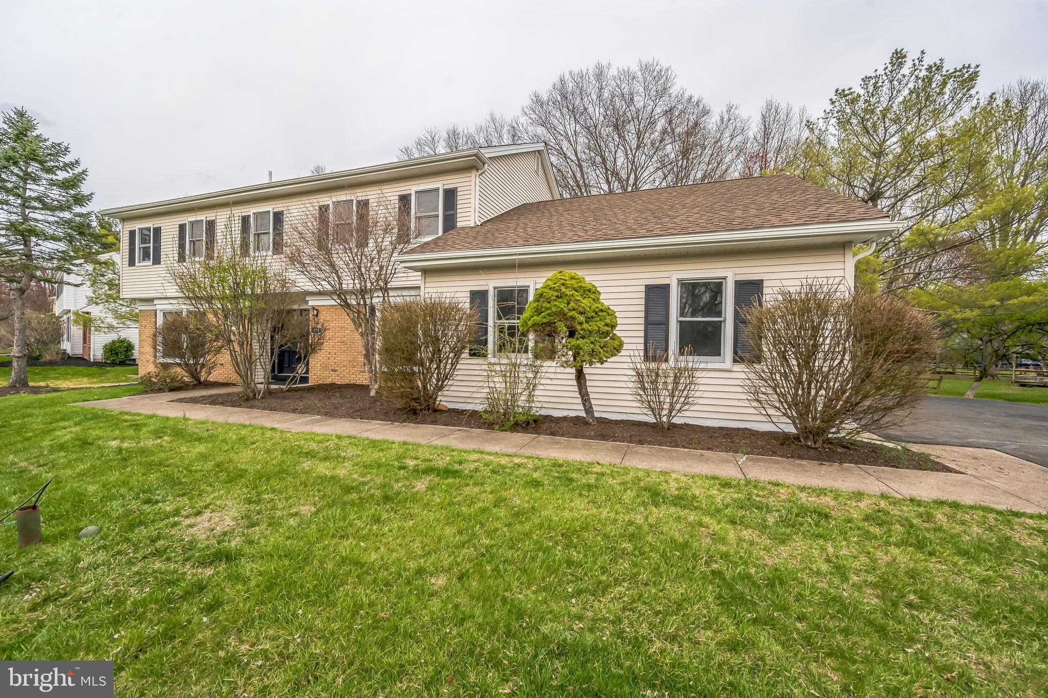 Welcome to 372 Sherwood Drive, a beautifully updated and well-maintained 4-bedroom, 2.5-bath single-family home located in the highly sought-after Wynnewood community and top-ranked Pennsbury School District. This home boasts a thoughtfully designed floor plan, spacious layout, modern updates, and a prime location with easy access to NJ/NY and Philadelphia.
As you enter, you’re greeted by a large foyer that offers a dramatic view of the family room, featuring a floor-to-ceiling stone wood-burning fireplace. The foyer flows into a bright and inviting living room, as well as an open-concept kitchen with granite countertops. Adjacent to the kitchen is a cozy breakfast room that leads to a charming deck—perfect for entertaining and enjoying the backyard.
The main level also includes an updated powder room, a versatile additional room, ideal for a guest room or home office, as well as a convenient mud/laundry room and access to the attached two-car garage. Upstairs, a spacious hallway overlooks the family room and leads to the master suite, which offers a walk-in & a double closets, double vanities and an updated private bathroom with a shower. Three additional bedrooms, each with double closets, and a fully updated hall bath with a dual-sink vanity and linen closet complete the upper floor.
The finished basement provides valuable extra living space, ideal for a home gym, playroom, or entertainment area.
Notable updates and features include a brand-new roof and siding, updated bathrooms, fresh professional paint throughout the house and garage, and stunning hardwood floors on the main floor and in the family room. This move-in-ready home is situated in an unbeatable location and on a prime lot, offering the rare benefit of a private wooded area at the back.  The deck which overlooks this serene, natural setting, provides a peaceful retreat & a sense of privacy that is hard to find. A truly a must-see, a home you won't want to miss! One year home protection (AHS-Shield Essential), is included with acceptable AOS.