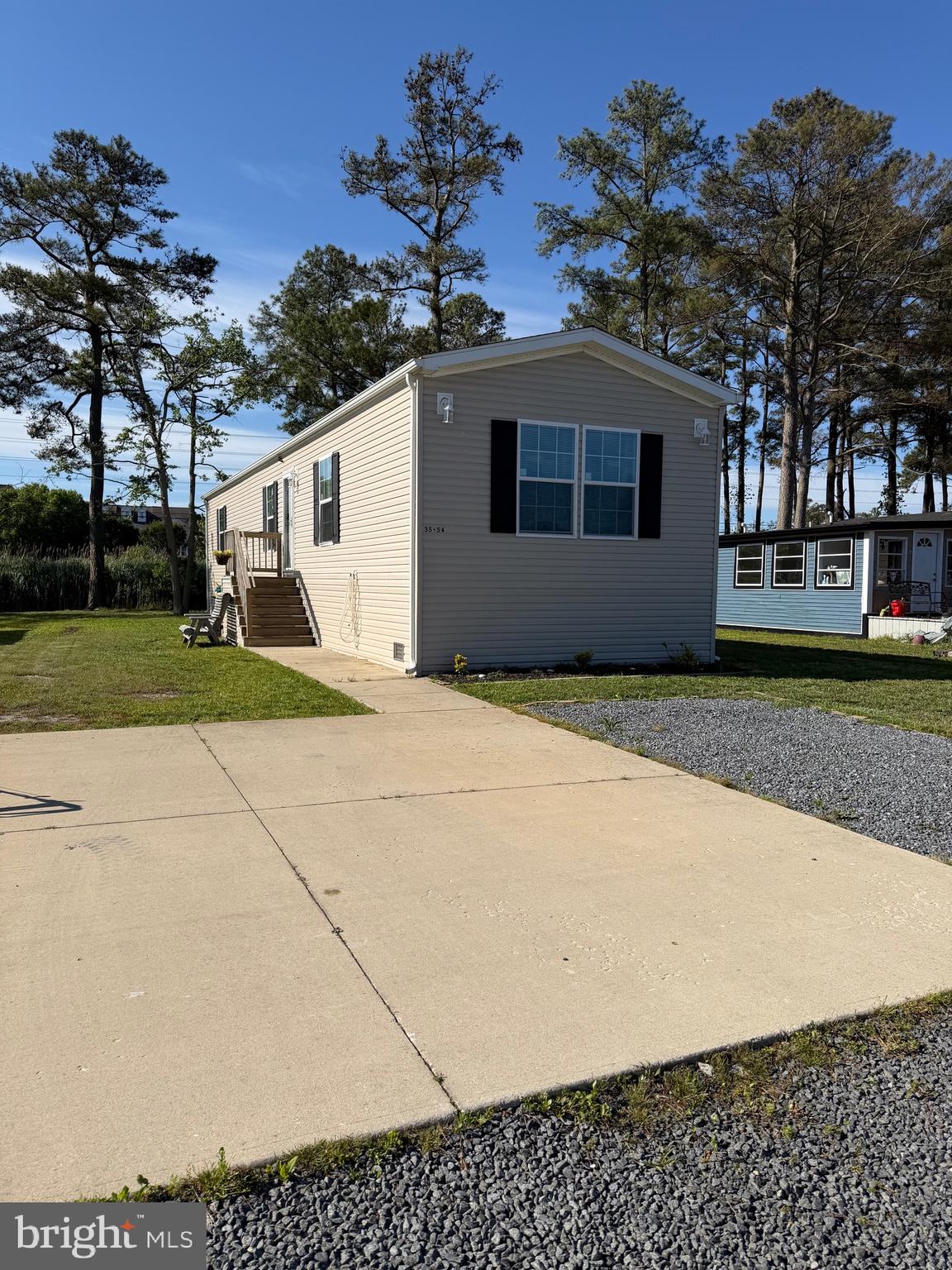 Enjoy coastal living in this well-maintained 3-bedroom, 2-bath single-wide home, located just 15 miles from the area's beautiful beaches. Situated in a desirable waterfront community, residents enjoy access to a boat ramp, swimming pool, clubhouse, and pavilion. Conveniently located near restaurants, shopping, and everyday amenities, this home offers the perfect blend of comfort, recreation, and accessibility. Whether you're looking for a full-time residence, vacation getaway, or investment opportunity, this property provides an excellent opportunity to enjoy the coastal lifestyle.