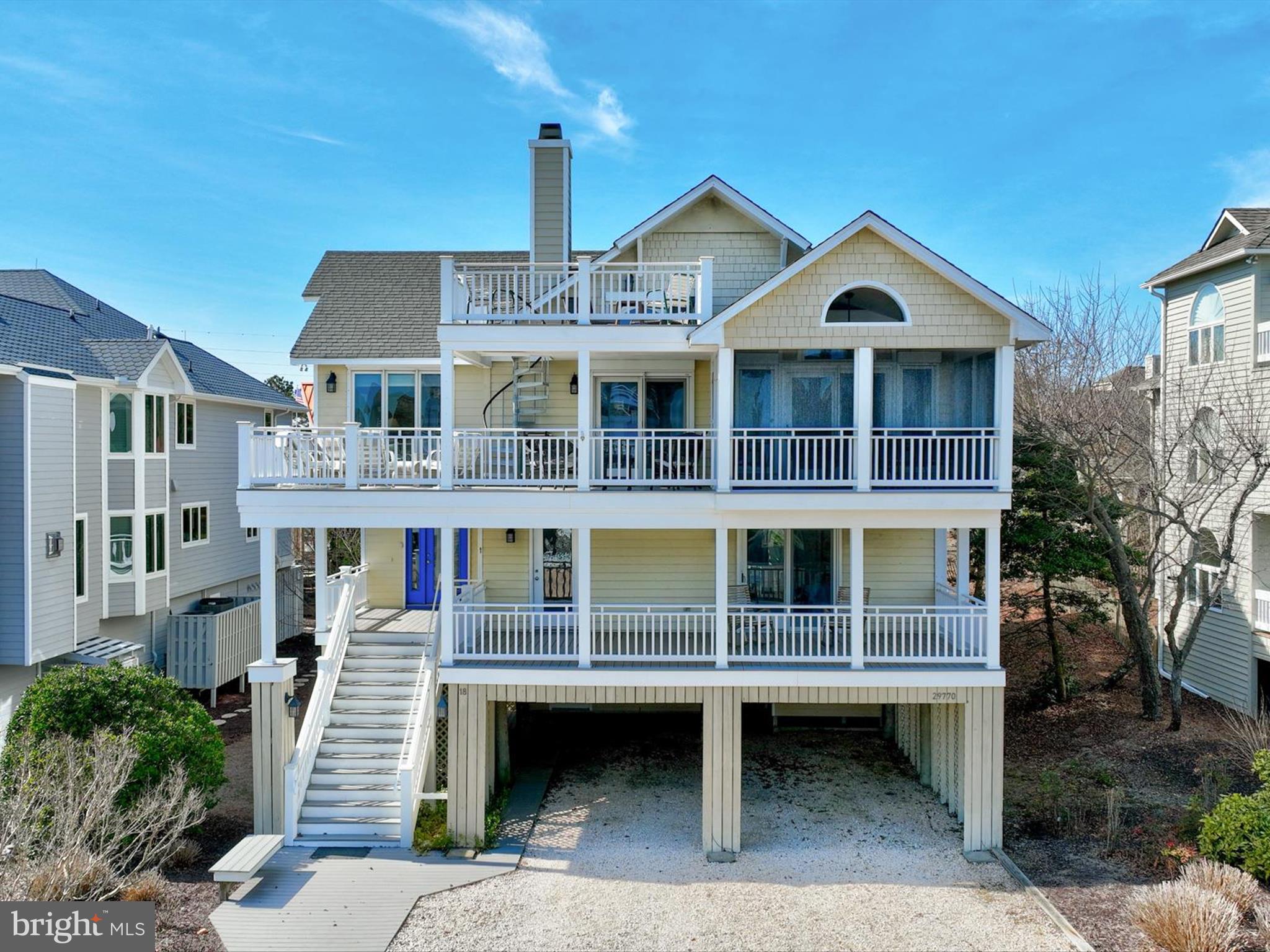 Welcome to your ocean-side oasis!  This well maintained home is located in Ocean Ridge - a community offering gated entrance, pool, tennis and private guarded beach access.  This home is positioned just one lot off the oceanfront and across from the beach walkway, affording it water views. This exquisite home features open floor plan, perfect for modern living and entertaining.  The first floor features a tile foyer 3 roomy bedrooms and 3 updated bathrooms  as well as a laundry room and  sitting room with access to a deck.  The main level features the great room which is anchored by a cozy stone fireplace, ideal for chilly evenings by the ocean. Vaulted ceilings highlight the open floor plan of the great room, dining room and kitchen.  Large windows flood the space with natural lighting and offers stunning views of the ocean.  The heart of the home is the kitchen, complete with a large island, perfect for meal prep and causal dining.  The open layout allows for seamless flow between the kitchen, dining area and living room, creating a welcome and inclusive atmosphere. There are 2 more bedrooms and 2 updated full bathrooms on the main level.  Each bedroom is a private retreat, offering comfort and style, while the bathrooms feature modern fixtures and finishes.  Outside you will find multiple decks one of which is screened-in, perfect for enjoying the ocean breeze and breathtaking views. Plus, this remarkable home features a den off the great room that is ideal for reading a book, playing video games or taking a much deserved nap.  Another surprise of this oceanside oasis is the third level seating area with private deck to capture the amazing sunrises. The ground level contains a half bath and outside you will find the outdoor shower, two storage rooms, covered and uncovered parking for plenty of cars.  There is also hurricane shutters.  Whether you are hosting a barbeque with friends or simply relaxing with a book, this outdoor space is sure to impress.  This home is being sold equipped and fully furnished.

Don't miss your chance to own this ocean-side paradise!

The home is currently rented through Long & Foster and has bookings for the summer.