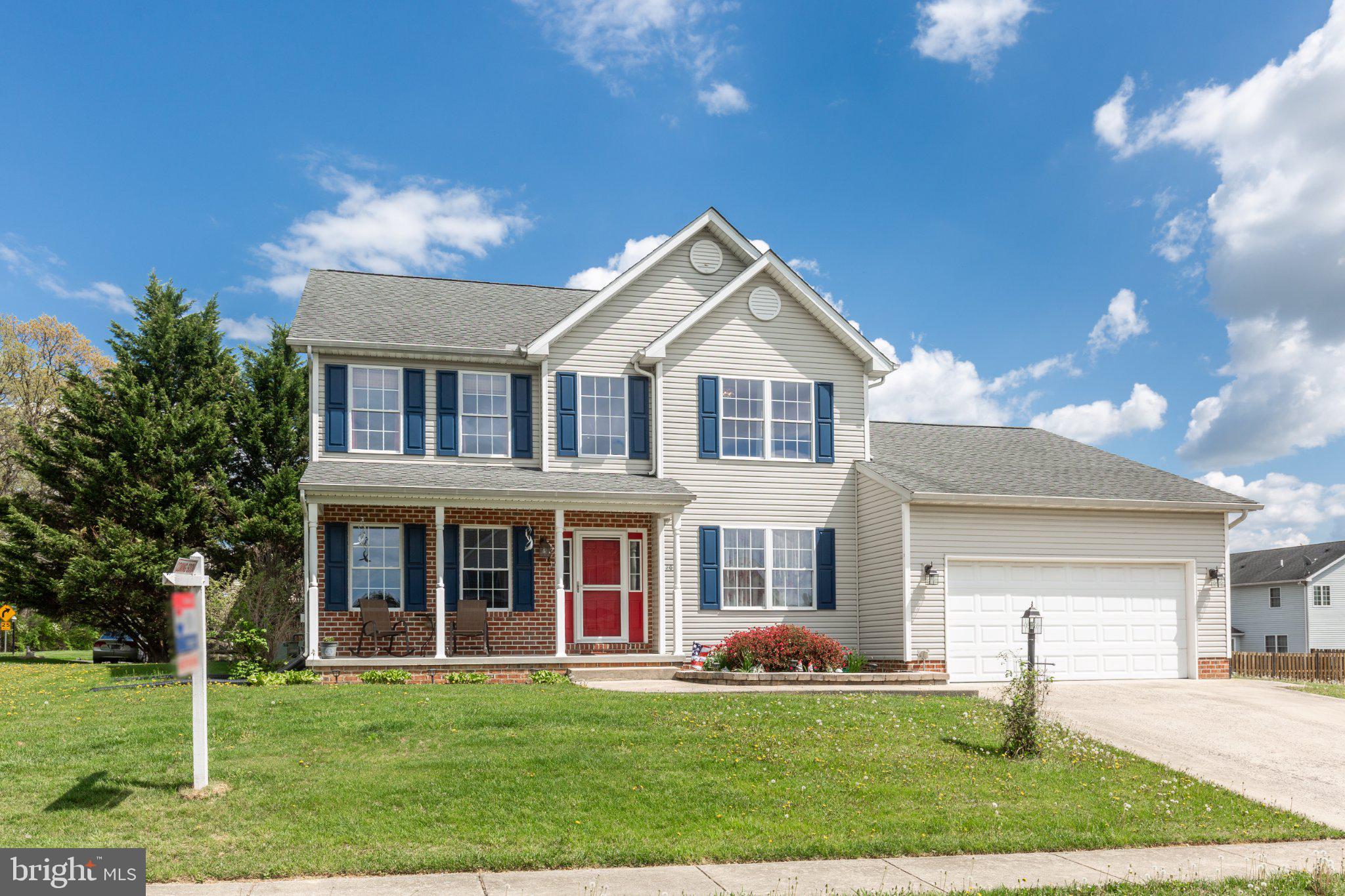 PRICE IMPROVEMENT ALERT for this Littlestown colonial home.  Beautifully crafted by Woodhaven Homes, this 2 story offers an impressive blend of space, flexibility, and comfort. This lovely home offers 4 bedrooms and 3 full baths, with a floor plan designed to adapt to your lifestyle.  There are not many floor plans that offer the freedom to customize the layout that works best for your needs. Enjoy an updated kitchen with LVP flooring, granite countertops, backsplash and modern appliances.  You will love a choice of dining spaces with a separate formal dining room or a cozy breakfast area that opens to a 3 season sunroom.  A formal living room plus a family room with fireplace are perfect for gatherings inside.  Outside gatherings can congregate in the spacious yard, in the sunroom and on the patio.  A main-level bedroom and full bath, ideal for a first-floor owner’s bedroom or multigenerational living option, currently used as a spacious home office.  Main level laundry and mudroom are conveniently located at the garage entrance.  Upstairs, a primary suite with two walk-in closets, updated bath with new vanity, walk-in shower, and soaking tub welcomes you to relax after a busy day.  Two more bedrooms and full bath are finished nicely and move-in ready.  A full basement, partially finished, has rooms already built with the versatility to make these what you need:  game room, workout room, craft or hobby area, office; walk up exit to back yard and separate utility area with water softener.  Enjoy a great yard with a fenced area directly off the sunroom and stocked gold fishpond. Open space at side yards ready for your ideas—flower and veggie gardens, play area or outdoor entertaining.  All of this with storage options in the basement and in the 2 car garage.  Must See.