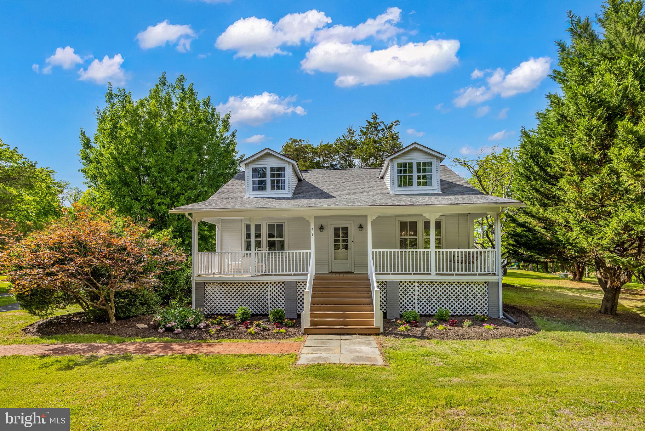FRESH PRICE! Fab Farmette! Set on over three private acres backing to a pond, this one-of-a-kind 1933 Cape Cod offers the rare combination of historic charm, usable land, and everyday convenience. This move-in ready property is a true country retreat — with room for horses, chickens, gardens, and gatherings — just minutes to shopping, dining, Stafford, Fredericksburg, Quantico and I-95!

A covered front porch welcomes you into the light-filled interior, where original pine floors, oversized windows, and thoughtful updates create a warm, inviting feel. The spacious entry opens to formal living and dining rooms. The recently renovated kitchen features marble countertops, stainless steel appliances, a center island, and custom glass tile backsplash.  Double French doors offers easy access to the expansive rear deck — an ideal setup for entertaining or simply enjoying the peaceful surroundings.

A spacious family room with an electric fireplace, an office with built-ins, and a full bath add flexibility for working from home or hosting guests. Upstairs, you’ll find three bedrooms including a spacious primary suite with a private dressing area and sink, along with an updated full bath.

The walk-out lower level adds even more flexible space with a large recreation room, bonus room, a half bath, and a spacious laundry/utility room. The home also boasts loads of storage throughout.

Outside, the property truly shines. Relax in the wood-fired Finnish sauna. Tend to horses in the barn. Gather fresh eggs from the chicken coop. Work on projects in the garage and workshop, or simply enjoy the open land and privacy. With A1 zoning, this farmette offers endless possibilities for hobby farming, recreation, gardening, animals, and income-producing opportunities. With no HOA and room to spread out, this is more than a home — it’s a lifestyle that’s increasingly hard to find in Northern Stafford.

Offering the best of both worlds, this private retreat is just minutes from everyday conveniences. Enjoy easy access to shopping, dining, Stafford, Fredericksburg, Mary Washington University, and Quantico Marine Corps Base. Commuter lots, HOV lanes, and I-95 are all nearby, providing an easy commute to Fort Belvoir, the Pentagon, and Washington, DC. Whether you're dreaming of a hobby farm, a private retreat, or simply more room to live and grow, this special property offers a lifestyle that's hard to find and even harder to leave.

Note: This property includes Dominion Energy easement. There are preliminary discussions about adding a line(s) to this easement. See Dominion Energy website for details on the North-Anna-Bristers project.