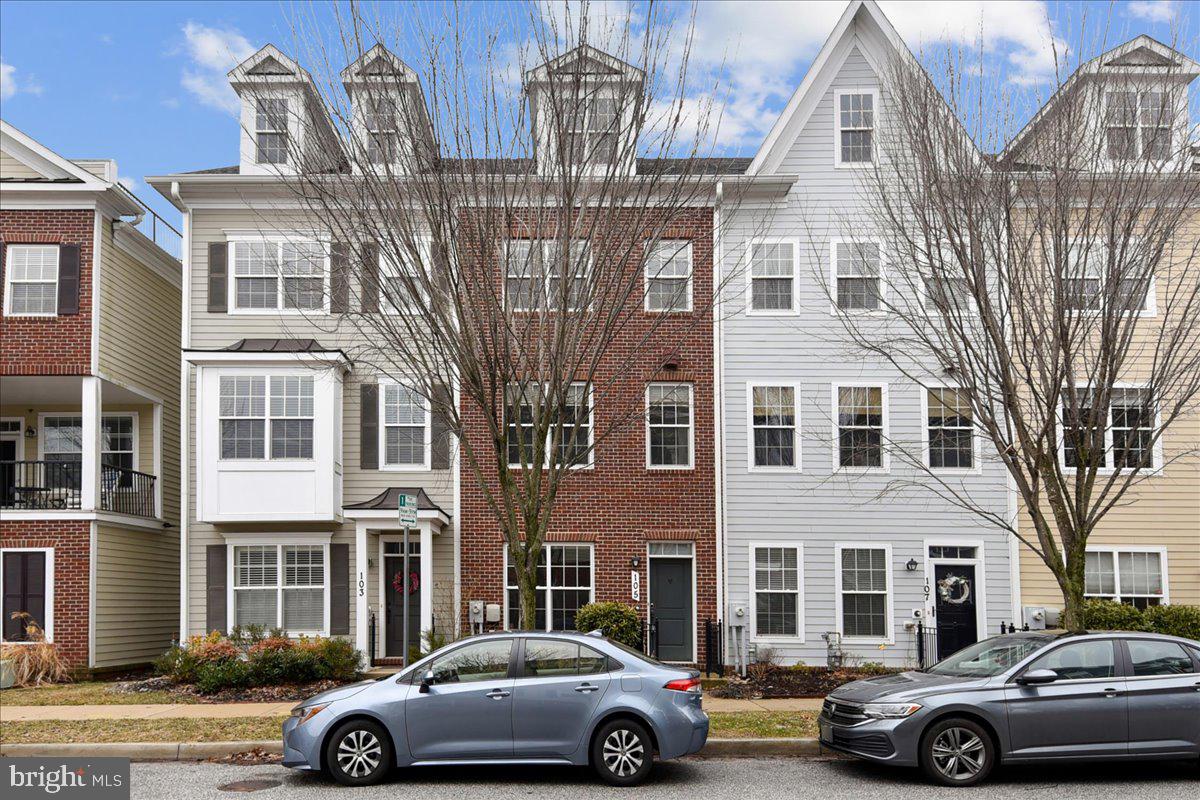 WOW!!!  New Price and wonderful offering!!
This townhouse offers the perfect blend of sophisticated "easy living" and modern convenience . Tucked away for privacy yet just minutes from the vibrant center of Towson, this home features a thoughtful layout across four levels. The entry level welcomes you with a dedicated home office and seamless access to a spacious two-car attached garage. Upstairs, the main living level boasts an expansive family room that flows into a modern chef’s kitchen, anchored by a large center island and a sun-drenched Juliet deck—perfect for morning coffee. This level is rounded out by a stylish half-bathroom. 

The third floor features two generous en suite bedrooms, each offering updated, private attached bathrooms and a conveniently located laundry closet. Crowning the home is a massive top-floor suite that includes its own half-bathroom and access to a large, private deck. With its prime location, modern updates, and ample working and entertaining space, this home is truly a rare find. All that's left to do is move right in.