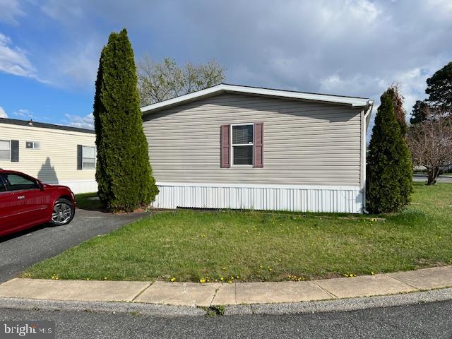 2 MONTHS FREE RENT IF YOU CLOSE IN APRIL.  FIXER UPPER DOUBLWIDE PRICED TO SELL.  GET A FANTASTIC DEAL ON A DOUBLEWIDE.   GREAT POTENTIAL IF YOU WANT TO FIX UP AND SELL OR DO THE REPAIRS FOR YOURSELF.  NEW STEPS AND DECK ON FRONT.   OPEN FLOOR PLAN.     PRIVATE FINANCING AVAILABLE.   GREAT LOCATION OFF OF ROUTE 40 AND ONLY MINUTES TO 95.  HOME SITS AN A NICE CORNER.   LOT RENT IS ONE OF THE BEST AROUND AT ONLY $725 MONTH.   COMMUNITY  CENTER WITH POOL.
