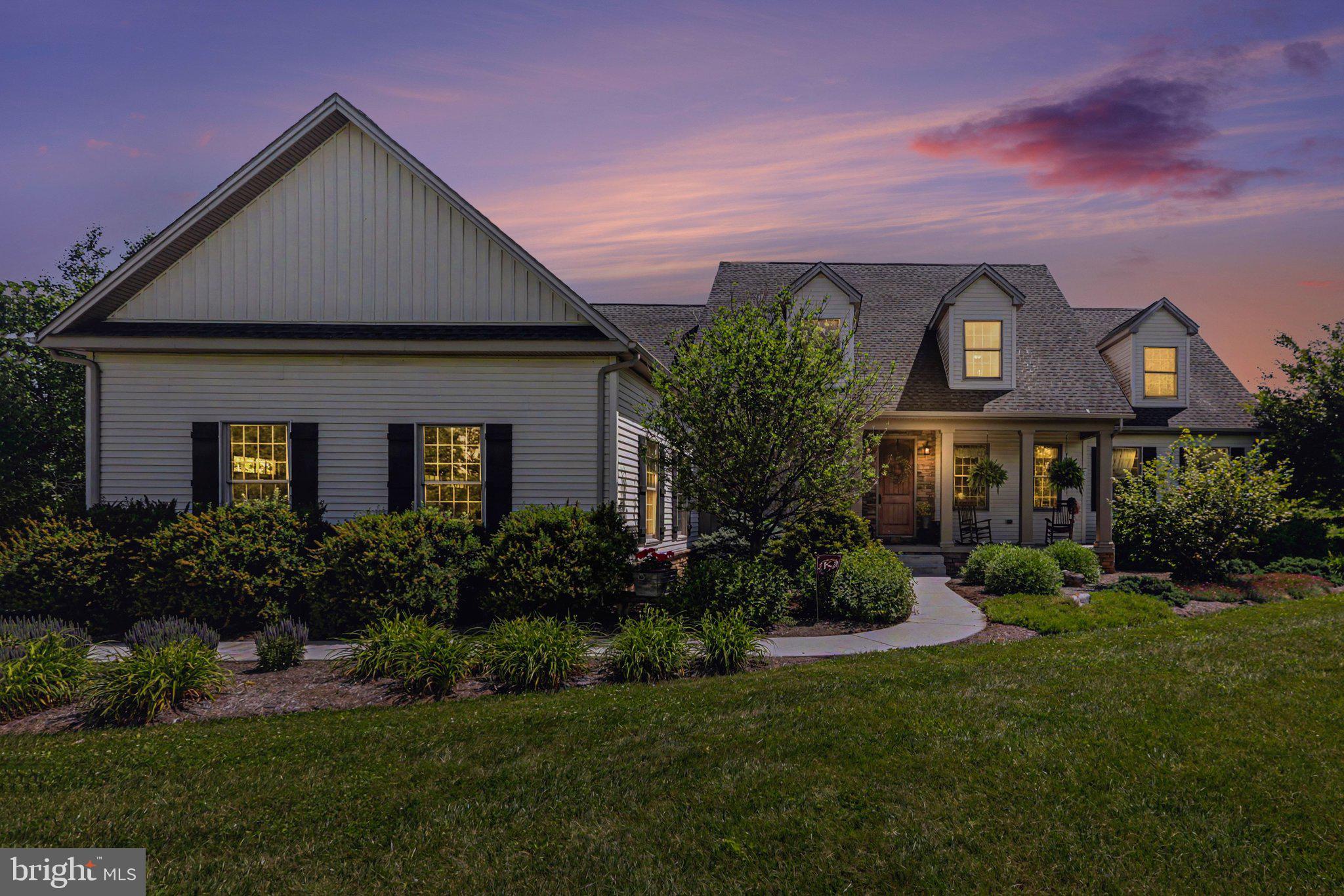 Welcome to 639 Mount Rock Road, an extraordinary custom-built estate set on 9.67 private acres in the picturesque countryside of Carlisle. Combining timeless craftsmanship, generous living spaces, and a breathtaking setting, this one-of-a-kind property offers the rare opportunity to enjoy peaceful country living without sacrificing convenience. Located just minutes from downtown Carlisle, major commuter routes, shopping, dining, and all that Cumberland Valley has to offer, this home truly delivers the best of both worlds.

From the moment you arrive, you'll appreciate the impressive curb appeal, beautifully landscaped grounds, and expansive three-car garage. Inside, soaring ceilings, abundant natural light, and thoughtful architectural details create an inviting atmosphere throughout. The heart of the home is the stunning open-concept living area, anchored by a dramatic floor-to-ceiling stone fireplace and overlooking the scenic acreage beyond. The gourmet kitchen features custom cabinetry, granite countertops, ample prep space, and a bright breakfast area, making it ideal for both everyday living and entertaining.

One of the home's most desirable features is the spacious main-level primary suite, offering the convenience of first-floor living paired with a true retreat-like feel. This private sanctuary includes a generous bedroom, large walk-in closet, and an ensuite bath designed for relaxation, complete with dual vanities, a soaking tub, and separate shower. The main floor also includes a formal dining room, laundry room, powder room, and multiple gathering spaces that provide flexibility for today's lifestyle.

Upstairs, you'll find two generously sized bedrooms, a full bath, and a large family room overlooking the great room below, creating additional space for guests, recreation, or a home office.

The expansive unfinished basement offers tremendous potential for future living space, a home gym, workshop, media room, or abundant storage. Outside, nearly 10 acres of rolling countryside provide endless opportunities for outdoor enjoyment, whether you're watching wildlife, gardening, entertaining on the patio, or simply taking in the peaceful surroundings and panoramic views.

Properties offering this combination of acreage, custom construction, main-level living, and an exceptional Carlisle location are rarely available. 639 Mount Rock Road is more than a home; it's a lifestyle, offering privacy, comfort, and room to grow in one of Cumberland County's most sought-after settings. Schedule your private showing today and experience everything this remarkable property has to offer.