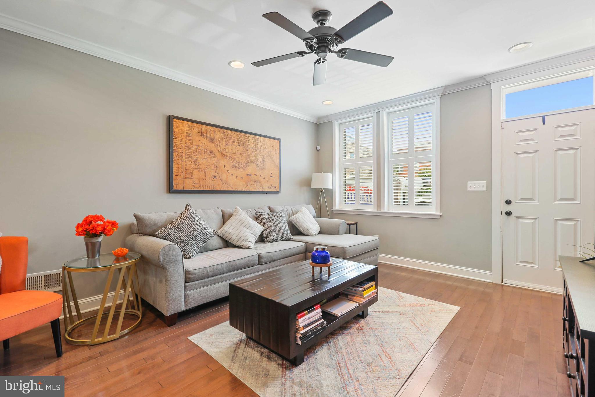 Gorgeous fully renovated 3 bedroom, 3 full bath home in Federal Hill! Entry level boasts hardwood floors, exposed brick, crown moulding, and recessed lighting. Gourmet kitchen with white shaker cabinets, kitchen island with pendant lighting and stainless steel appliances. Primary bedroom with en suite bath with stand up shower with shower heads, double vanity and two closets. Second bedroom, hall bath and access to a huge roof top deck on upper level. The basement has been fully finished with third bedroom/rec room, full bath and laundry. This MK built home is a must see!