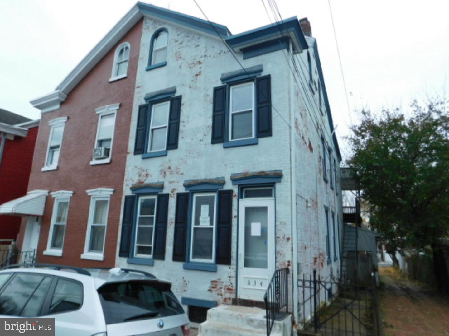 Reading City semi-detached home with 5 bedrooms, 2 full bathrooms, and a two car garage.