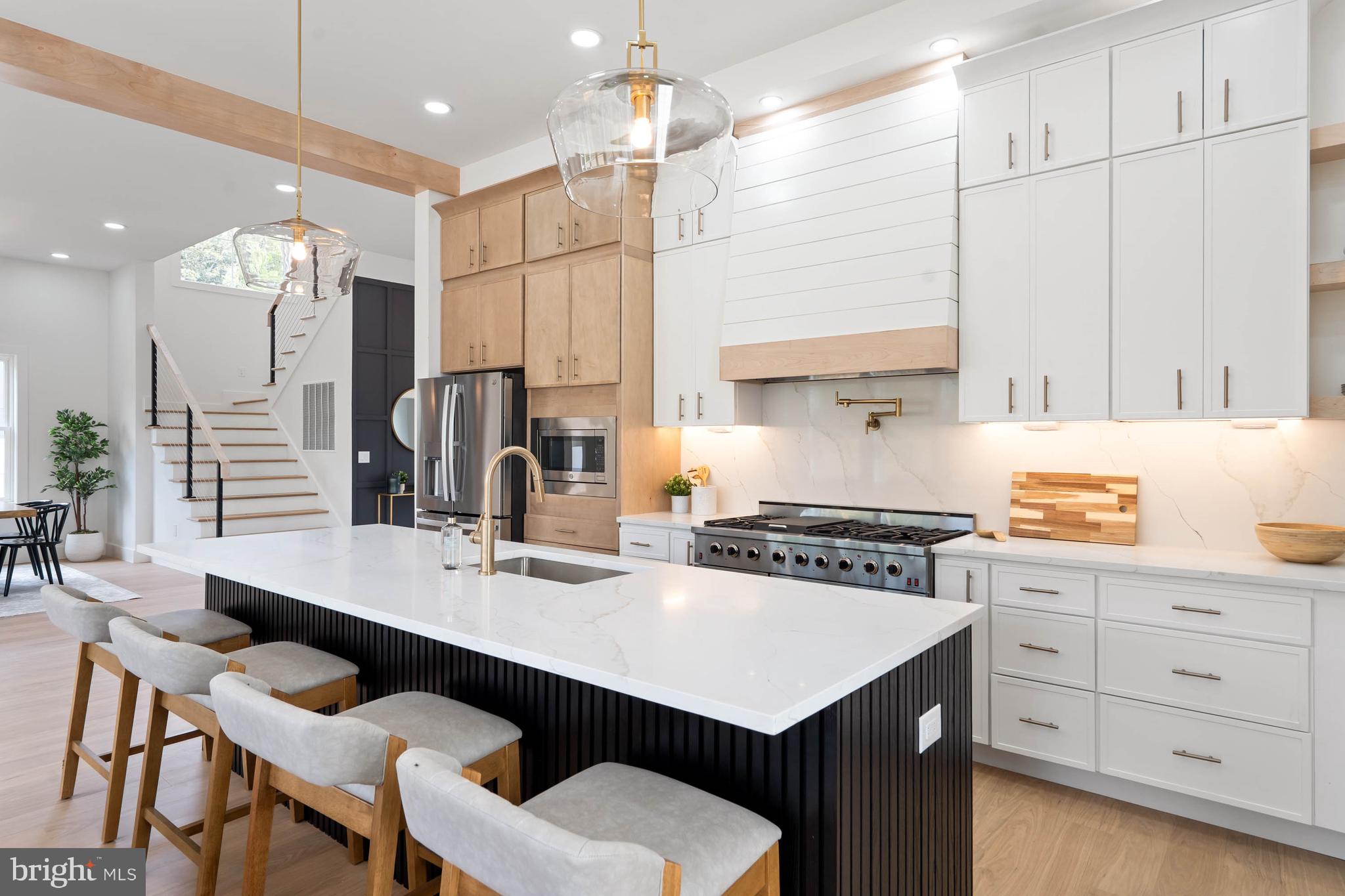 STUNNING NEW CONSTRUCTION (TO BE BUILT) IN REHOBOTH BEACH - EAST OF ROUTE ONE!  Welcome to 19762 Norwood Street, a carefully designed, custom-built home by an award winning builder. This 6BR/5.5BA contemporary beach-chic home is within walking distance of downtown Rehoboth Beach. This unique property boasts plenty of room for the whole family with multiple living areas, an in-ground pool, a multi-car garage, and a spacious back yard.  Perfect for entertaining or simply enjoying the coastal lifestyle, this 2-story home has everything one could need.  Situated east of Route One, this home is walkable to downtown Rehoboth Beach and has easy access to award winning restaurants, tax free outlet shopping, the Junction Breakwater bike trail, and state parks. The area is ideal for year round living, beach goers and outdoor enthusiasts. The front of the house features beautiful landscaping and a large driveway, with a double-door entryway and custom finishes. The first floor features include an open floor plan with 11-foot ceilings, scores of windows for natural light, a gas fireplace, and a family friendly cooking and gathering kitchen with quartz countertops, stainless steel appliances and large island with seating. There is a main level primary bedroom with en-suite bathroom, custom tile work and finishes. Rounding out the first floor there is a kitchen pantry, a laundry room, an office, a powder room, a dining area, a multi-car garage, and a tankless hot water heater. Step outside to enjoy the outdoor living spaces. The deck and screened porch are perfect for al fresco dining or just lounge in the sun by your private, heated pool. The second floor staircase features cable railings. There are also stacked closets that can easily be converted into an elevator shaft in the future. The second floor opens to a spacious living area with 10-foot ceilings. There are five bedrooms on this level with three of the bedrooms having en-suite bathrooms with custom tile work, finishes and walk-in closets.  Completing the second floor there are two more bedrooms and a hall bathroom, a second level large laundry center, and additional closet space for storage.  Don't miss out on the opportunity to own this contemporary masterpiece in Rehoboth Beach.  Schedule your showing today and experience coastal living at its finest!