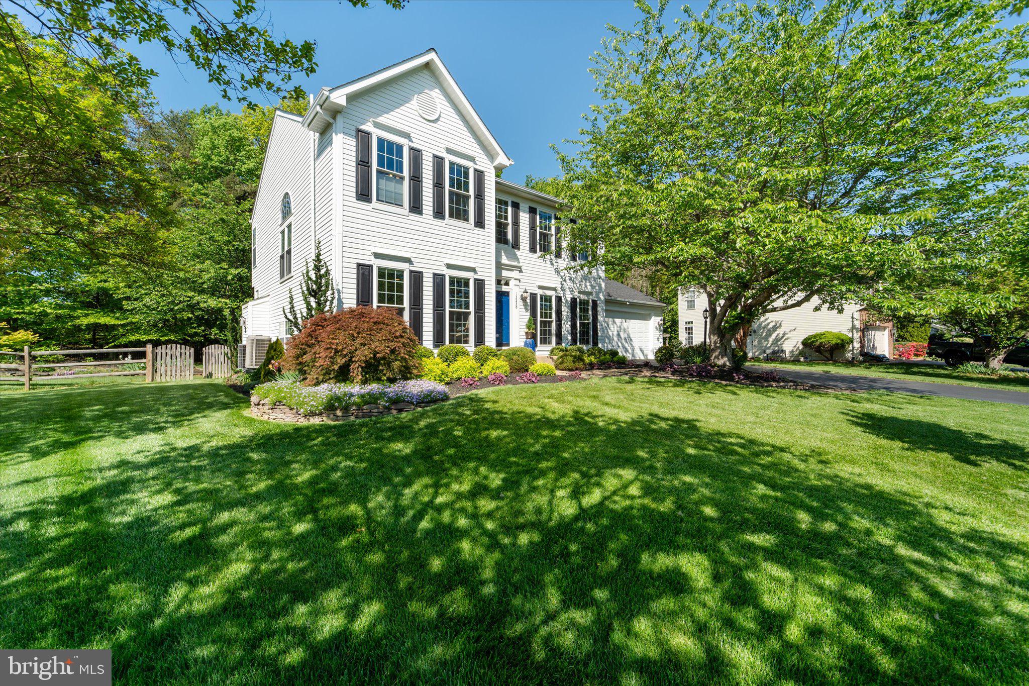 Welcome to this stunning single-family home in the desirable Meadowbrook Woods community! Situated on over half an acre, you'll notice the beautiful landscaping and lawn, which sets the tone for a peaceful retreat. The interior of the home boasts a formal dining room, perfect for special occasions, and a cozy living room/sitting room ideal for relaxation. A powder room provides convenience for guests, while the large family room, adjacent to the kitchen, is perfect for family gatherings. The kitchen features granite countertops and stainless steel appliances, making meal prep a breeze. A bright sunroom off the kitchen leads to the deck and patio, where you can enjoy the fenced rear yard and take in the view of your wooded backyard. The gorgeous built-in Pergola is the perfect spot to unwind and entertain. Upstairs, the primary bedroom is a serene oasis, complete with a walk-in closet and a stunning, renovated spa-like bathroom. The bathroom features a rain shower, upgraded plumbing hardware, a frameless shower door, and a gorgeous pedestal tub, which creates a relaxing retreat. Three additional spacious bedrooms on the upper level share a beautifully renovated hall bathroom. The finished lower level offers ample storage, a full bath, rec room , and a home gym. Additional features include a whole-house humidifier and sauna, making this home a true haven. Recent updates include new front windows on both levels, upgraded lighting, crown molding, and chair rail, adding a touch of sophistication to the interior. The roof is just two years old, and the water heater and HVAC are in good working condition. Don't miss out on this incredible opportunity to own a piece of paradise in Meadowbrook Woods, an active community with pool, swim team, calendar of events, and zoned for the highly rated school tier of Marshall ES, Benton MS, and Colgan HS.
