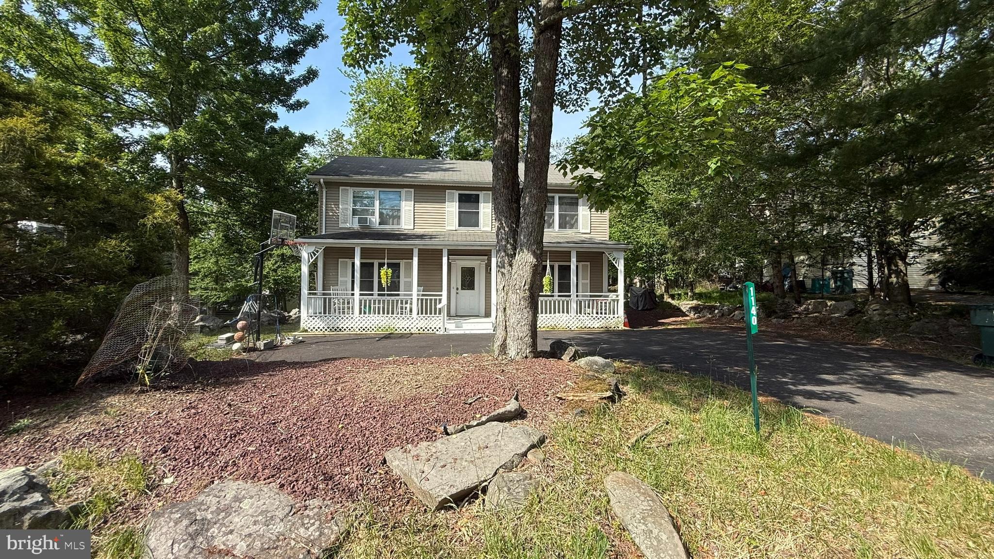 Welcome to this charming 3-bedroom, 2-bath home located in the amenity-filled community of Pocono Country Place. This well-maintained property offers a spacious and functional layout with comfortable living areas, abundant natural light, and plenty of room for both everyday living and entertaining. The inviting living and dining spaces flow seamlessly, creating a warm and welcoming atmosphere throughout the home. A large primary bedroom provides a relaxing retreat with ample space for a sitting area, home office nook, or additional furnishings, and two additional bedrooms offer flexibility for family or guests. Step outside to the screened-in porch, an ideal spot to enjoy your morning coffee or unwind in the evening while taking in the peaceful surroundings. The backyard offers plenty of space for outdoor activities including a fire pit, perfect for gathering with family and friends year-round. Huge outdoor shed in excellent shape, perfect to store all your tools, landscaping equipment, or anything else you could want to! Residents of Pocono Country Place enjoy access to a wide range of community amenities, including swimming pools, lakes, beaches, playgrounds, sports courts, and year-round recreational activities. Conveniently located near shopping, dining, major highways, and many of the Pocono Mountains' most popular attractions, this home is ideal as a primary residence, vacation getaway, or investment opportunity. Don't miss your chance to enjoy all that Pocono living has to offer. Schedule your private tour today!