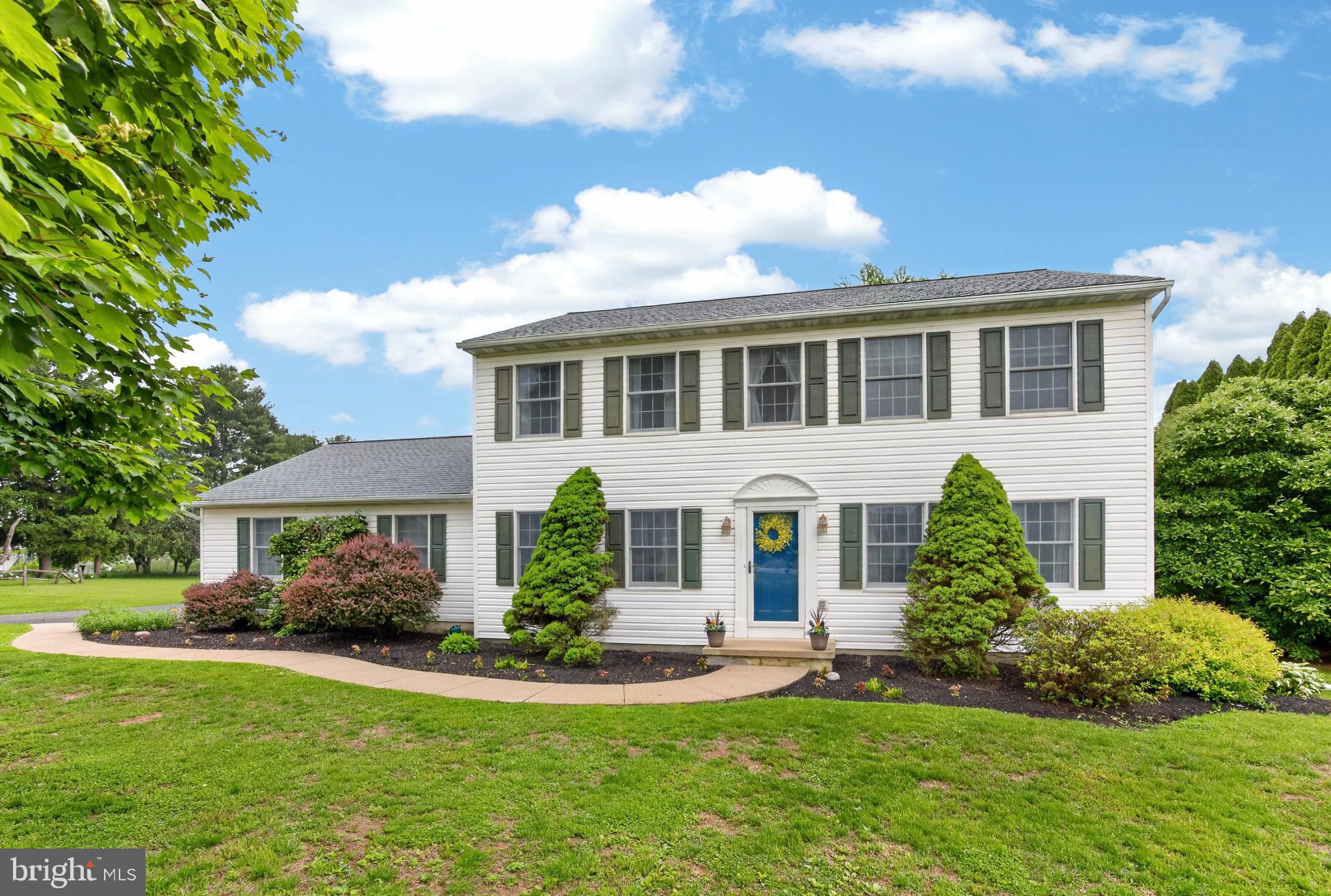 Surrounded by Berks County farmland, this spacious colonial is sure to impress. Situated on a perfect 1+ acre lot in Daniel Boone School District, this home offers over 2,000 sq ft of living space with 4 bedrooms and 2.5 baths. Entering from the front porch you will immediately notice the care and pride the owners have. A formal living room sits to your right followed by a relaxing family room just off of the large eat-in-kitchen. This great space features quartz countertops, stainless appliances, pantry and easy to care for laminate flooring. Next to the kitchen, opposite the formal living room sits the formal dining room. A convenient half bath completes the first floor. Upstairs you will find 4 bedrooms and a hall bath. The spacious primary suite offers walk-in-closet and large private bath with tub shower. This home does not lack storage. Between the attic and basement, you will have plenty! Parking is not a concern here either with an oversized 2 car attached garage as well as ample driveway space. Enjoy quiet evenings on your back patio, taking in the breathtaking sunsets! Sellers have taken great care of this property. Some upgrades include: new roof (with warranty), basement waterproofing (with warranty), water treatment, newer carpet and recently serviced HVAC. No HOA, no cookie cutter development, this property is a stand out! Take a look and fall in love...before it's too late!